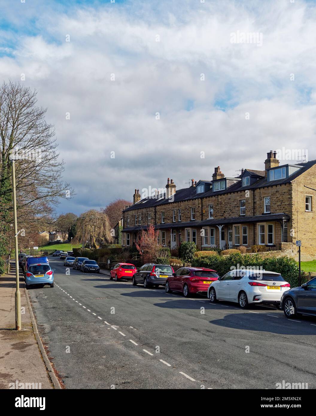 Terraced stone built houses facing the River Wharfe at Ilkley Riverside