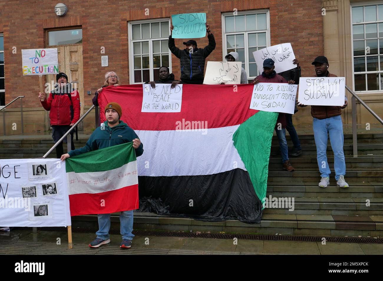 Iranian Protestors outside Derby City Council House on New Year's Eve 2022 protesting against the alleged murder by Iranian police of Mahsa Amini Stock Photo