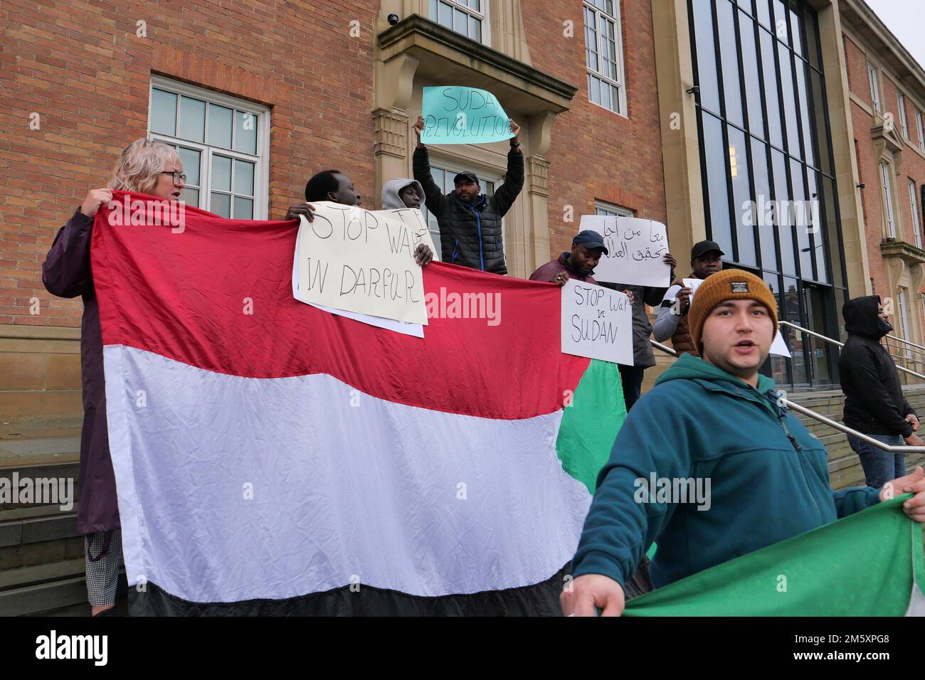 Iraninan Protestors outside Derby City Council House on New Year's Eve 2022 protesting against the alleged murder by Iranian police of Mahsa Amini Stock Photo
