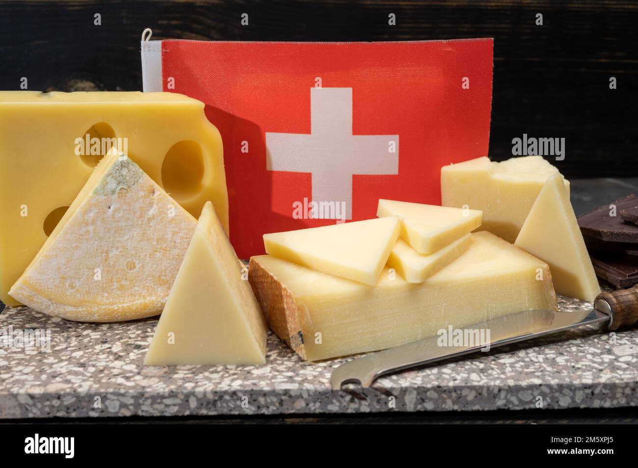 Assortment of Swiss cheeses Emmental or Emmentaler mediumhard cheese