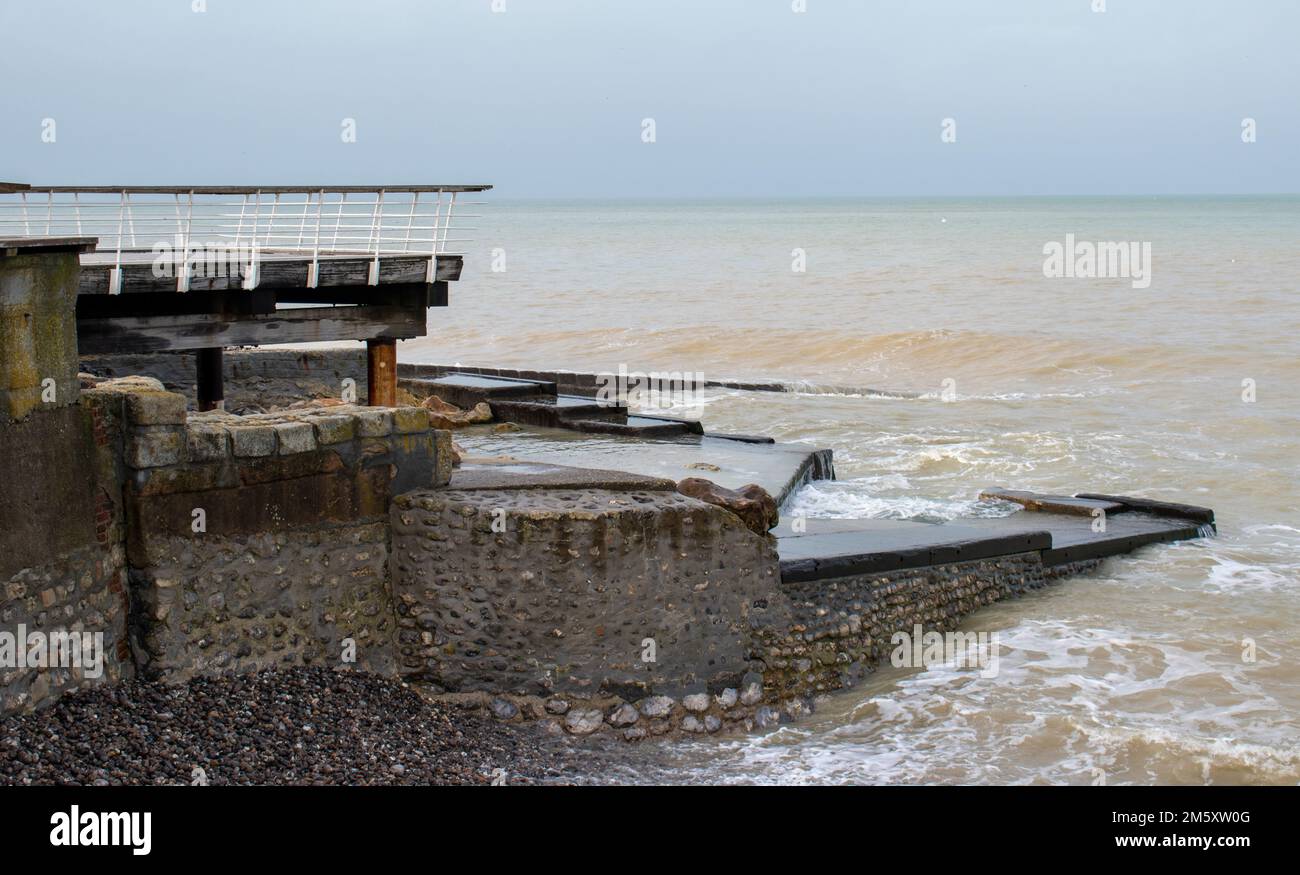 The sea mill on the Veules-les-Roses seafront in Normandy (France) Stock Photo