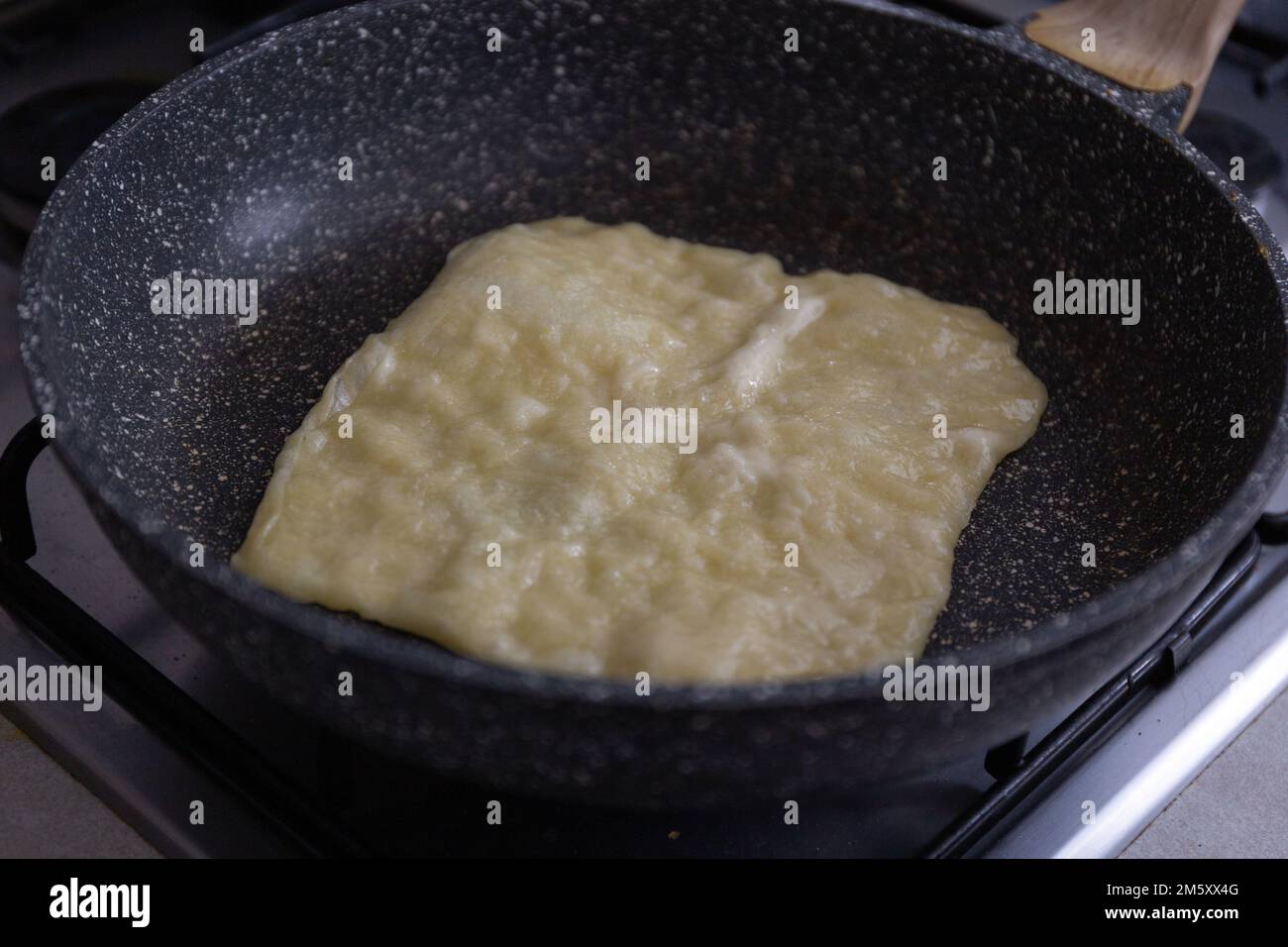 Moroccan Msemen flaky bread in the pan Stock Photo - Alamy