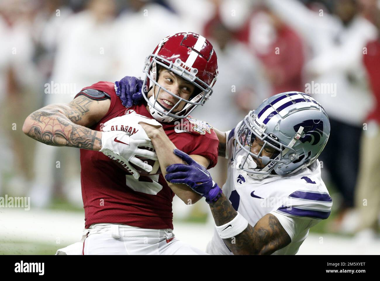 New Orleans, United States. 01st Jan, 2023. Kansas State Wildcats safety Josh Hayes (1) tackles Alabama Crimson Tide wide receiver Jermaine Burton (3) during the Sugar Bowl at the Caesars Superdome in New Orleans on Saturday, December 31, 2022. Photo by AJ Sisco/UPI Credit: UPI/Alamy Live News Stock Photo