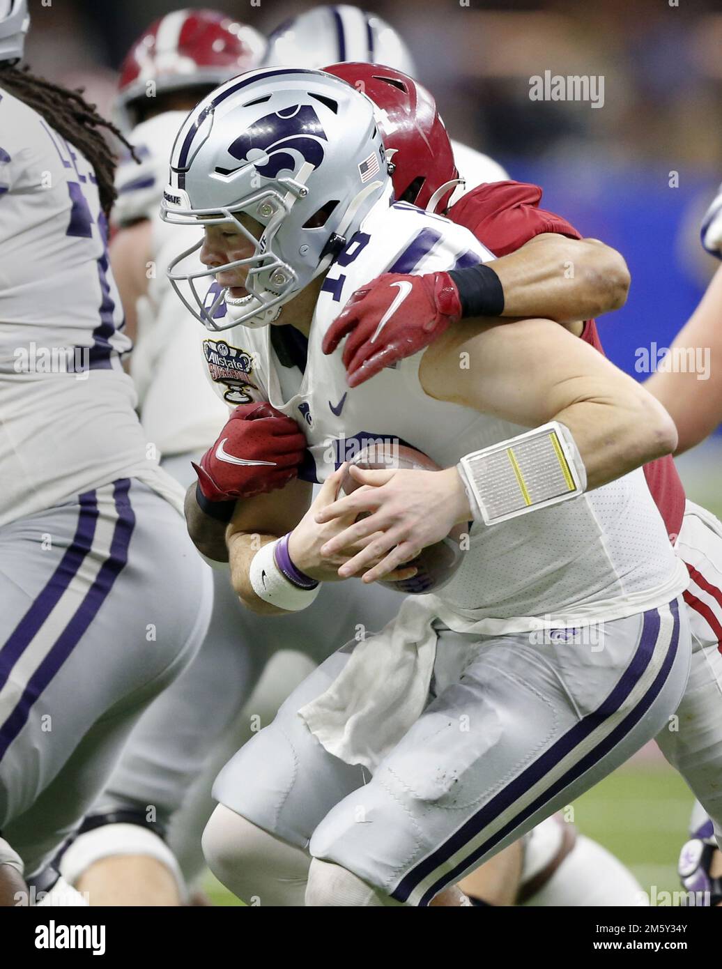 New Orleans, United States. 01st Jan, 2023. Alabama Crimson Tide defensive back Malachi Moore (13) sacks Kansas State Wildcats quarterback Will Howard (18) during the Sugar Bowl at the Caesars Superdome in New Orleans on Saturday, December 31, 2022. Photo by AJ Sisco/UPI Credit: UPI/Alamy Live News Stock Photo