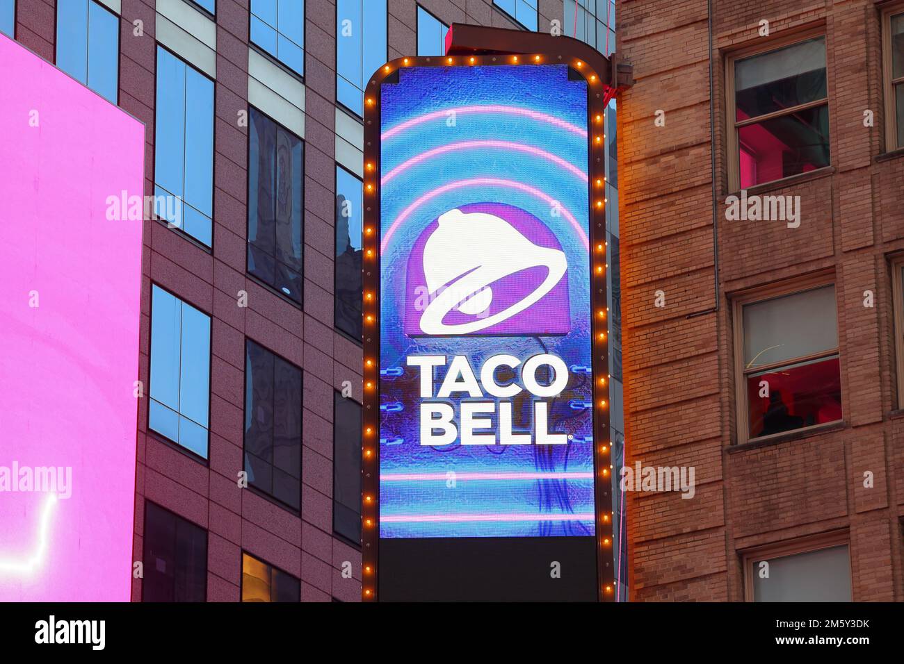 Taco Bell marquee signage in Times Square, New York. Taco Bell is a fast food restaurant Stock Photo