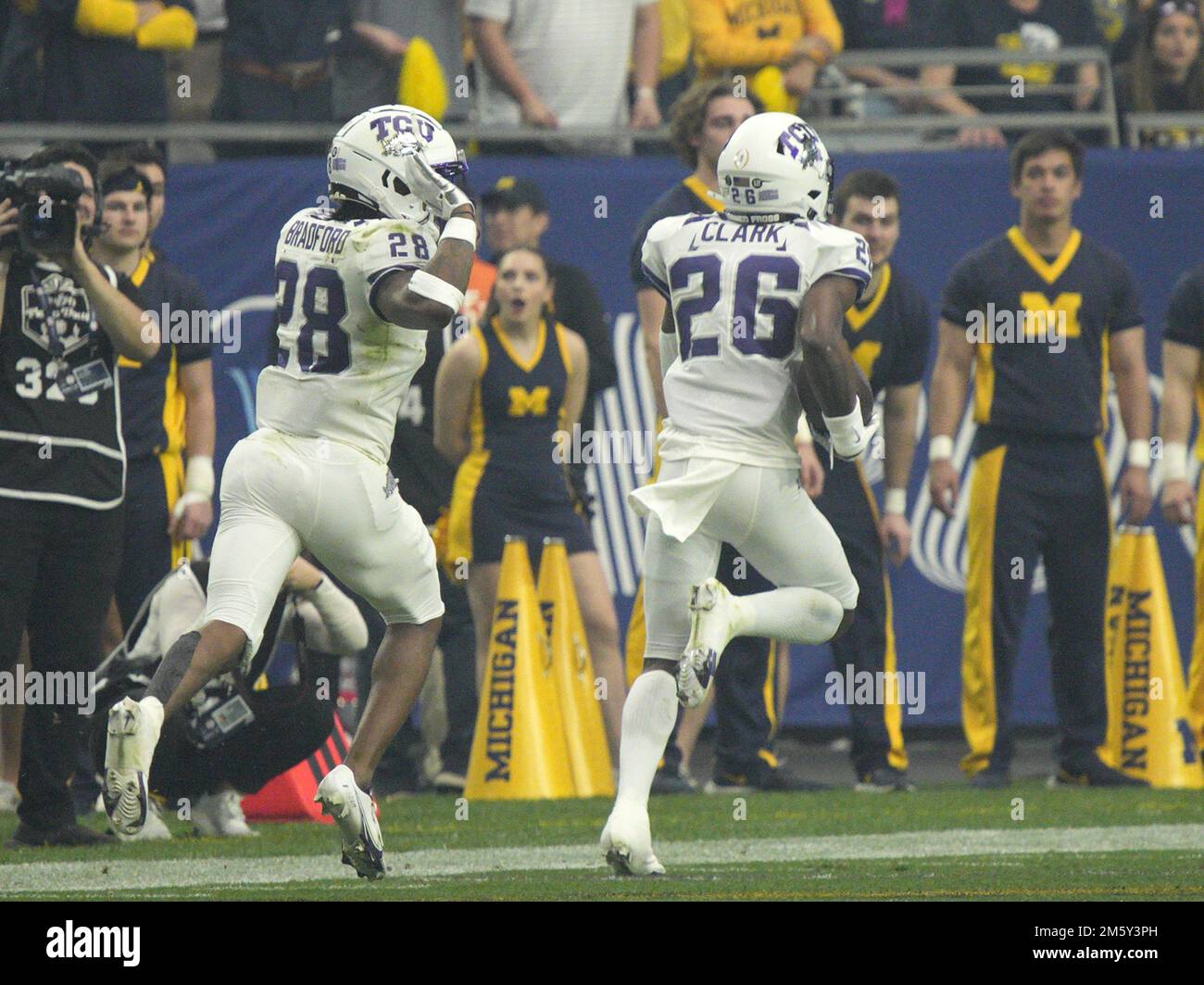 Glendale, United States. 31st Dec, 2022. TCU safety Bud Clark returns an interception 41-yards for a touchdown against the Michigan Wolverines during the first quarter at the CFP Semifinal Vrbo Fiesta Bowl at State Farm Stadium in Glendale, Arizona on Saturday December 31, 2022. Photo by Bob Strong/UPI Credit: UPI/Alamy Live News Stock Photo