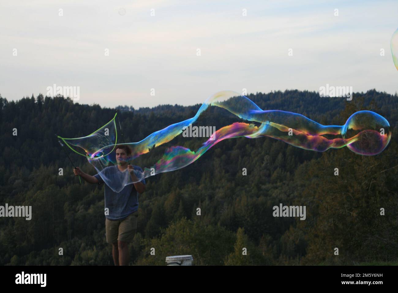 Giant Bubble Popping Stock Photo Alamy