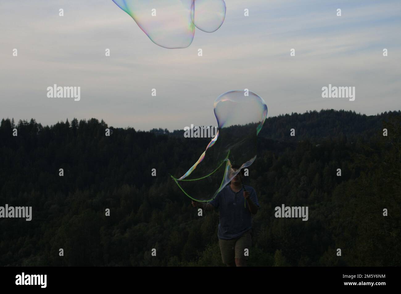 Giant Bubble Popping Stock Photo Alamy