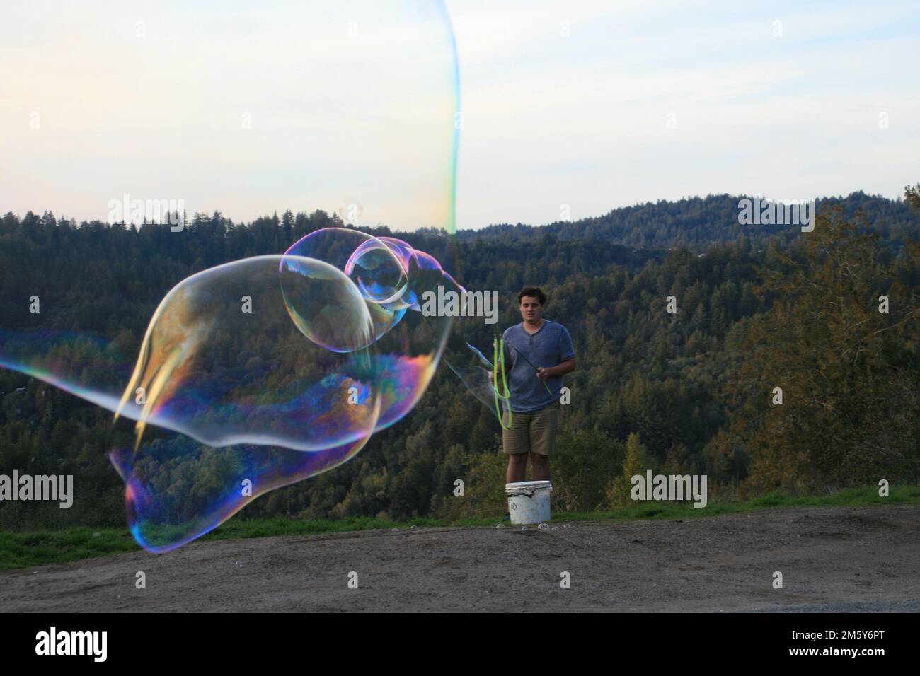 Giant Bubble Popping Stock Photo Alamy