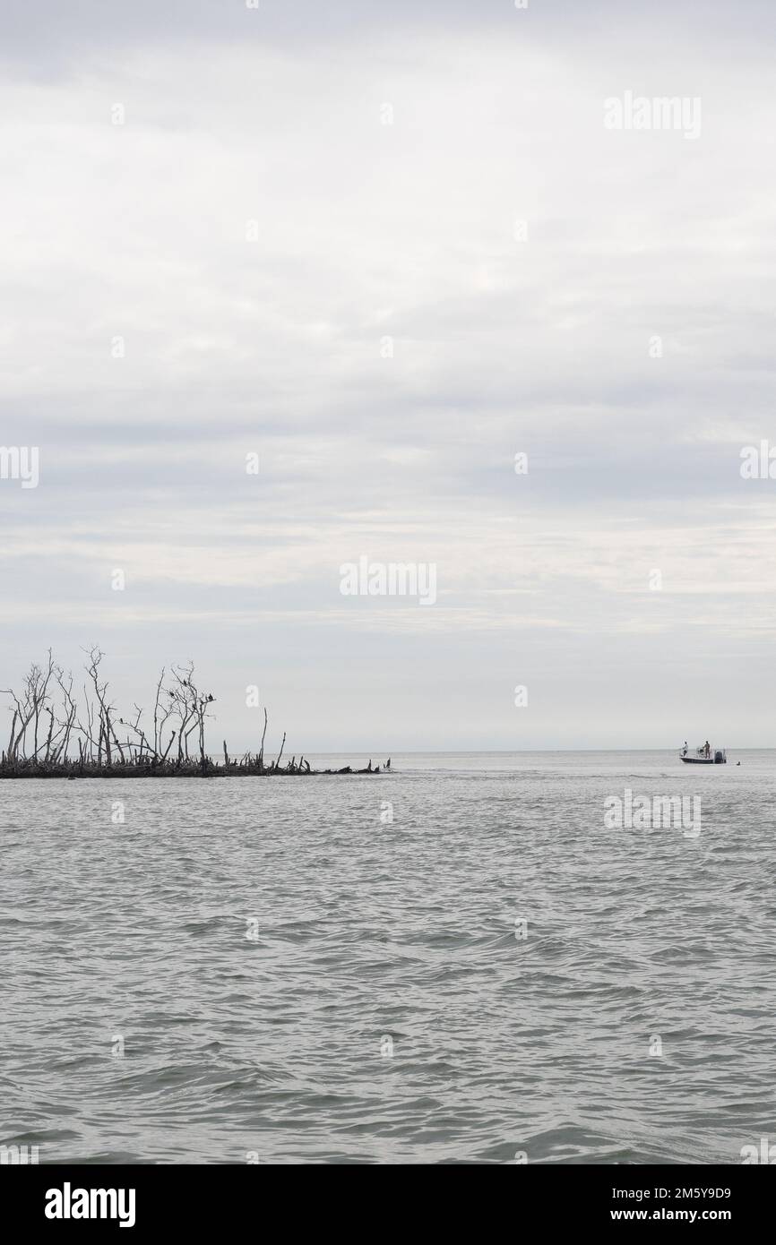 A boat on the Gulf of Mexico near the Ten Thousand Islands in Florida. Stock Photo