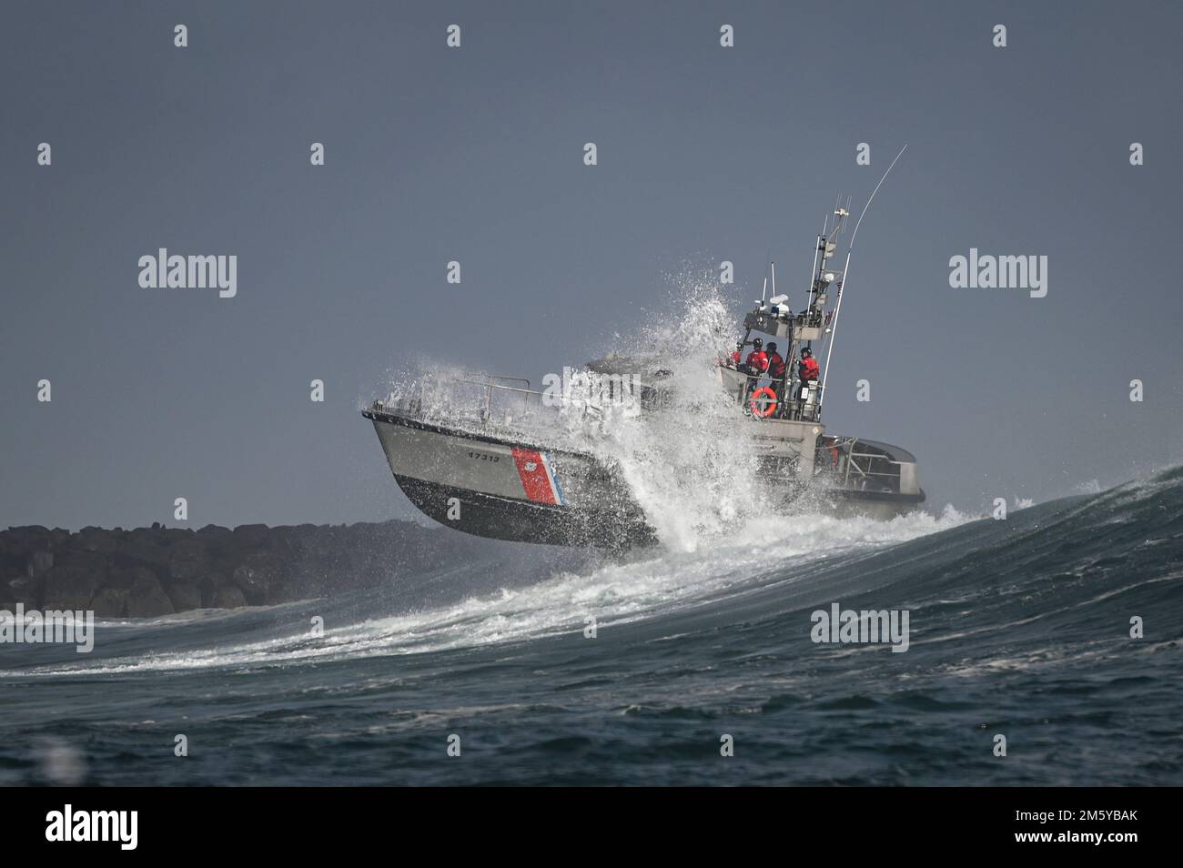 A crew aboard a 47foot Motor Lifeboat from Coast Guard Station Umpqua River conducts surf