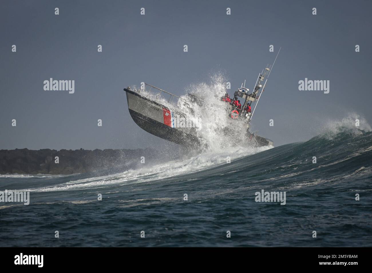 A crew aboard a 47foot Motor Lifeboat from Coast Guard Station Umpqua River conducts surf