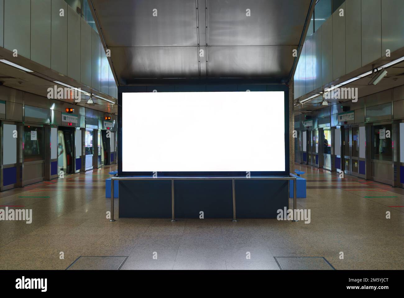 Blank billboard in subway or metro station, Useful for advertising. Stock Photo