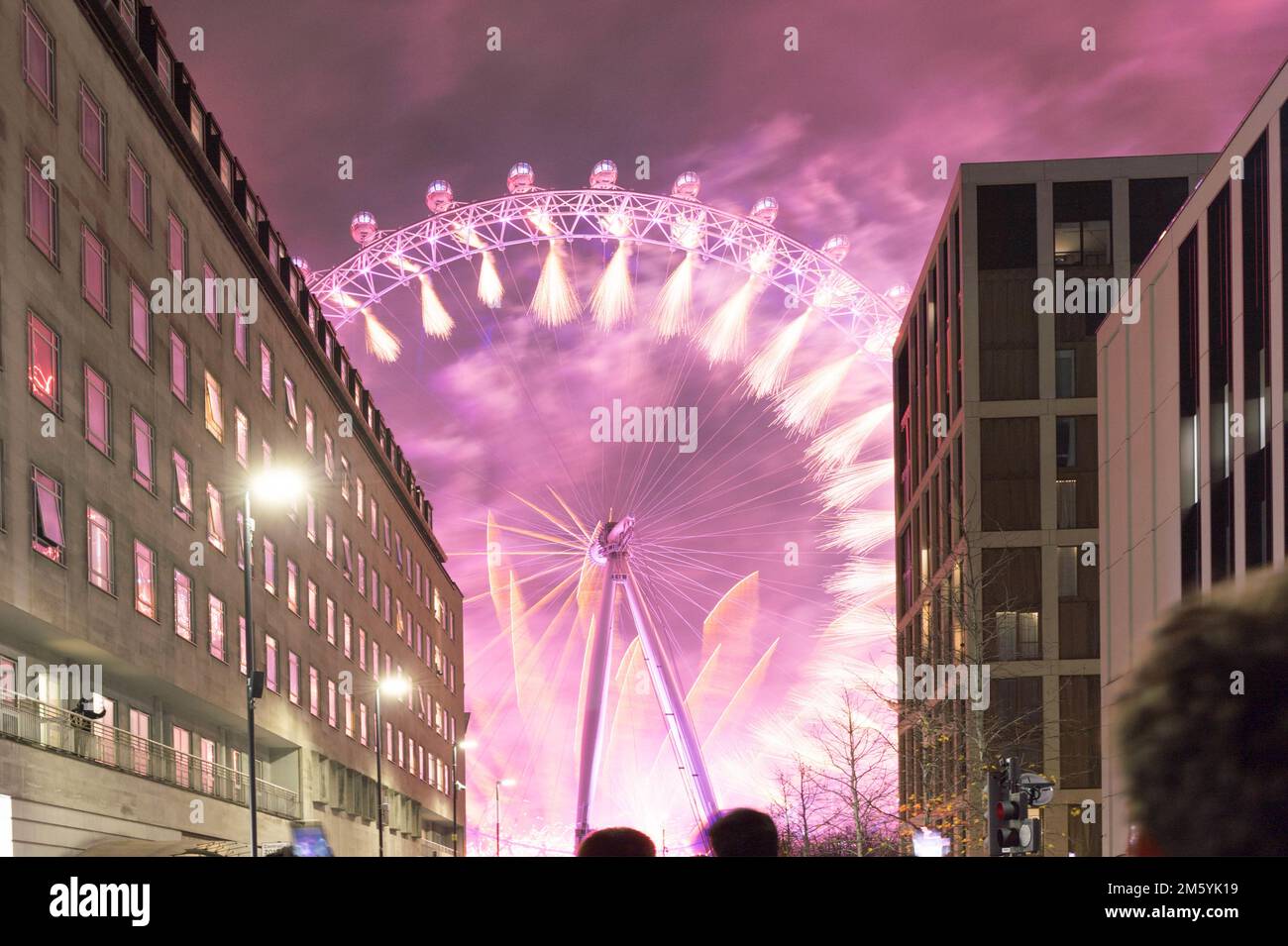 London UK. 1st January 2023. London ringing in New Year with fireworks at London Eye, a traditional new year celebration party in central London, UK. Stock Photo