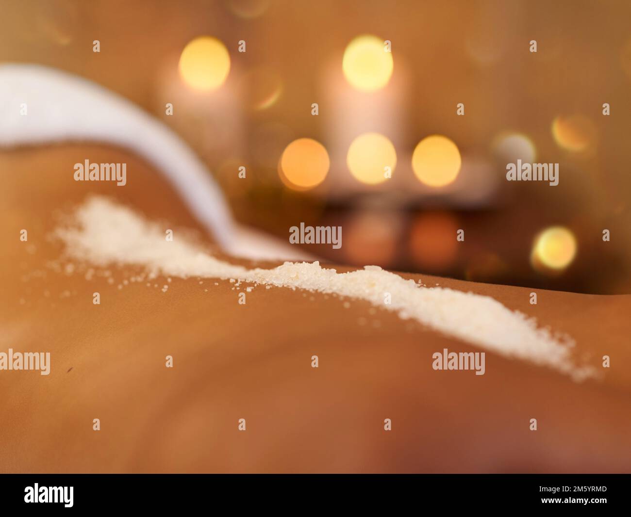 Whole body skin care. a young woman getting an exfoliating treatment at the spa Stock Photo Alamy