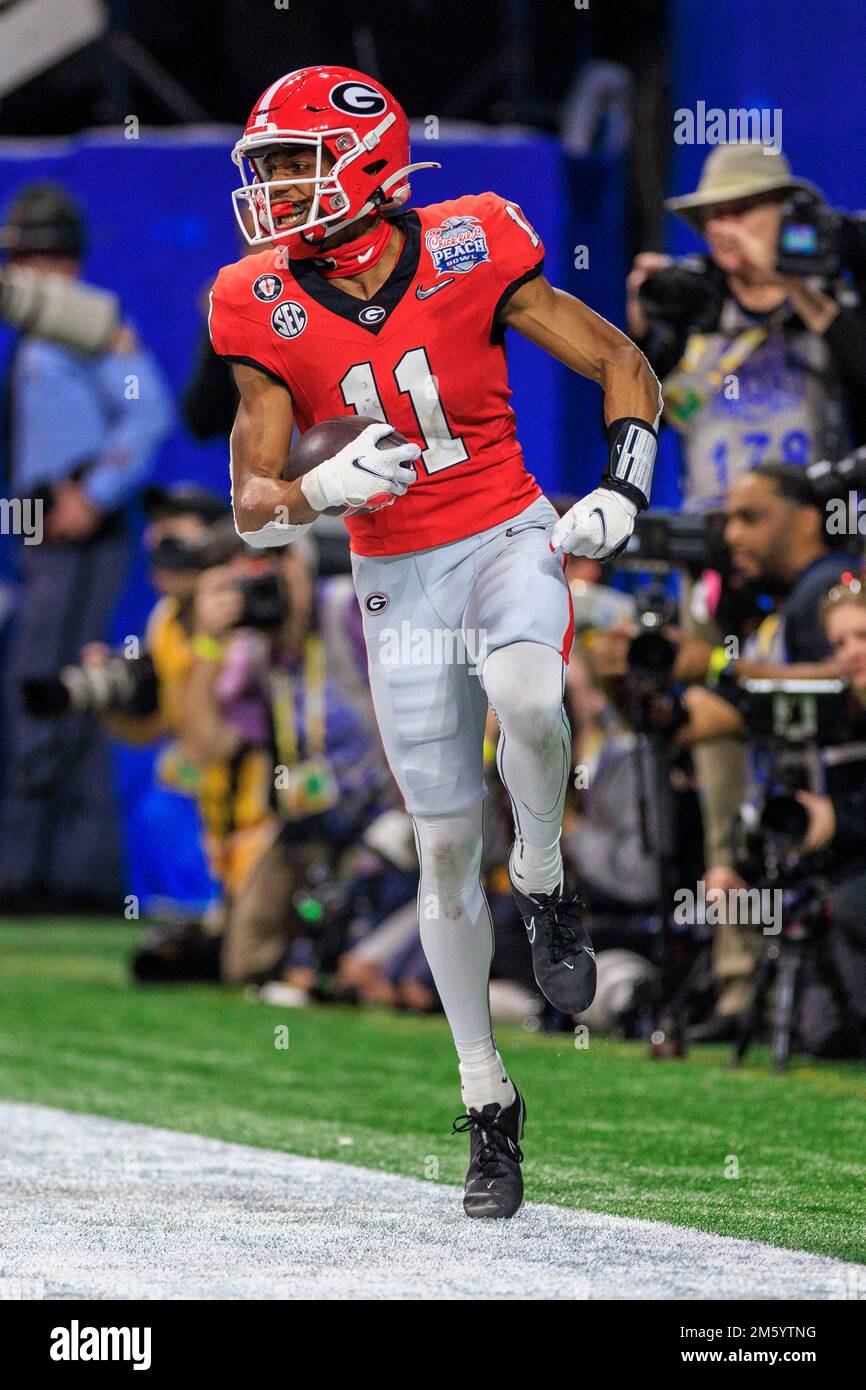 December 31, 2022 wide receiver Arian Smith (11) celebrates