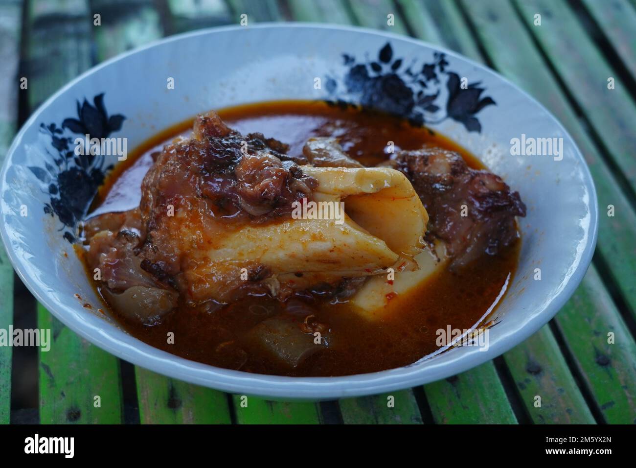 Spicy Foot cow soup is the Indonesian food especially in Madura Island Stock Photo