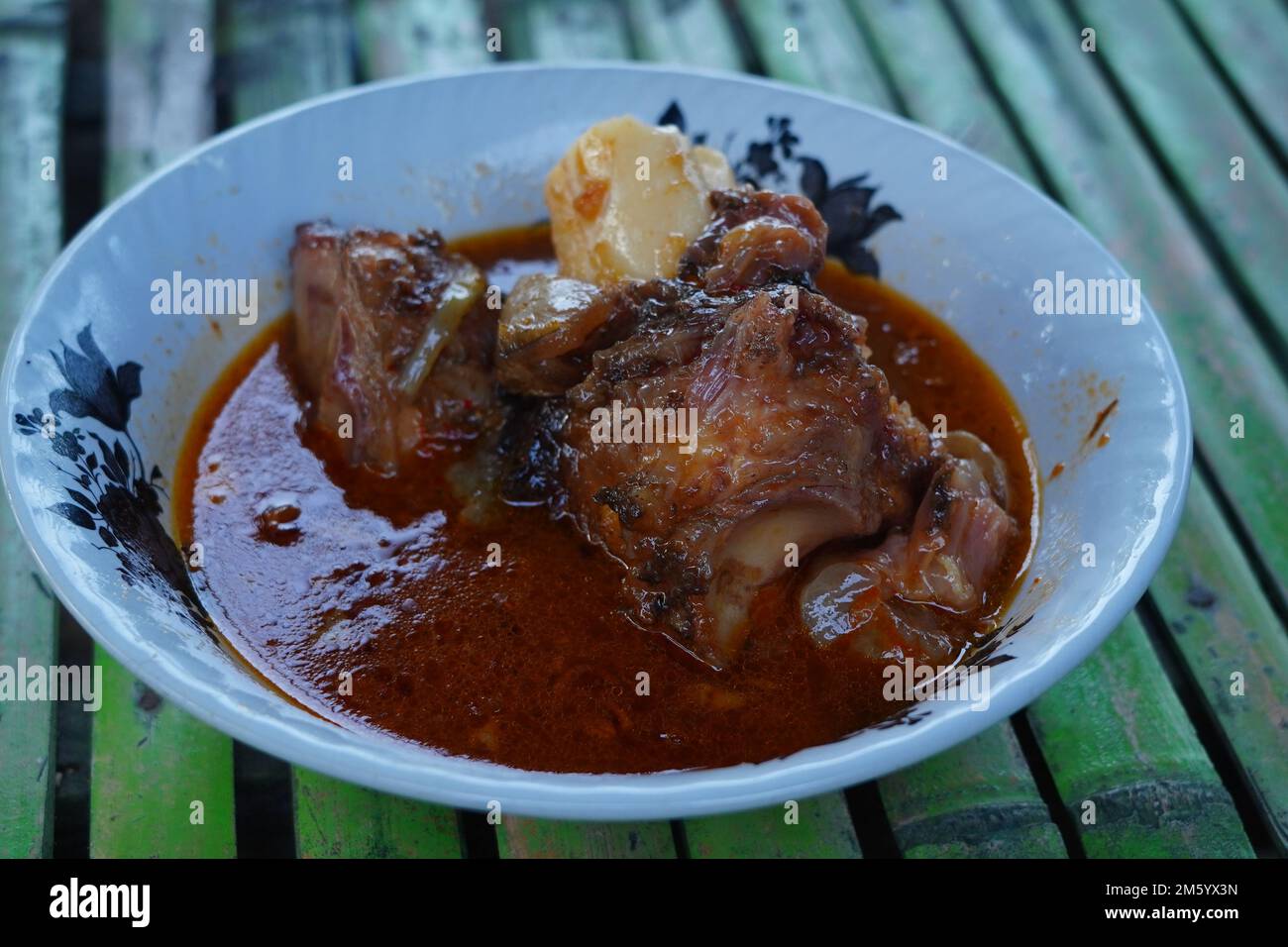 Spicy Foot cow soup is the Indonesian food especially in Madura Island Stock Photo