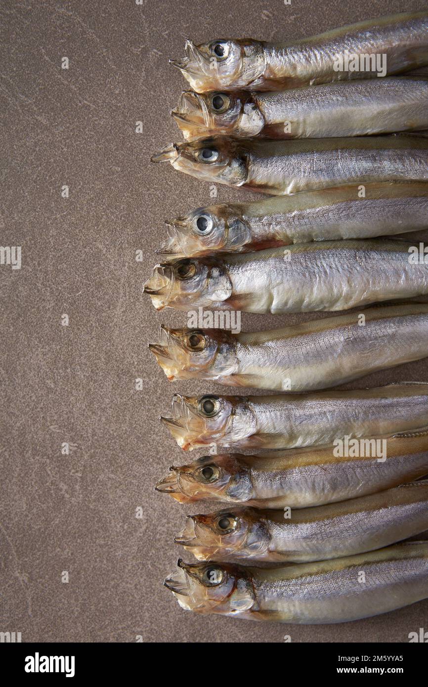fresh smelt on stone plate Stock Photo