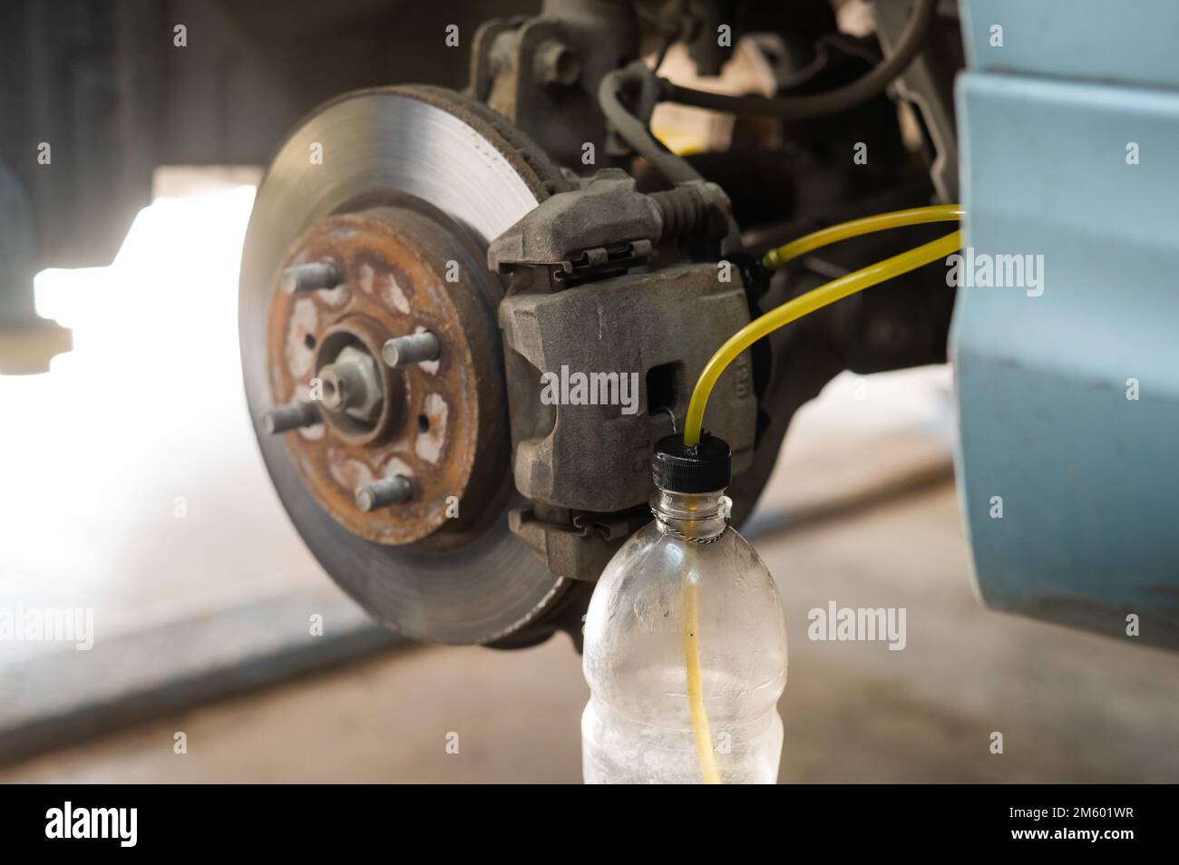 Automatic change of brake fluid in a car service Stock Photo Alamy
