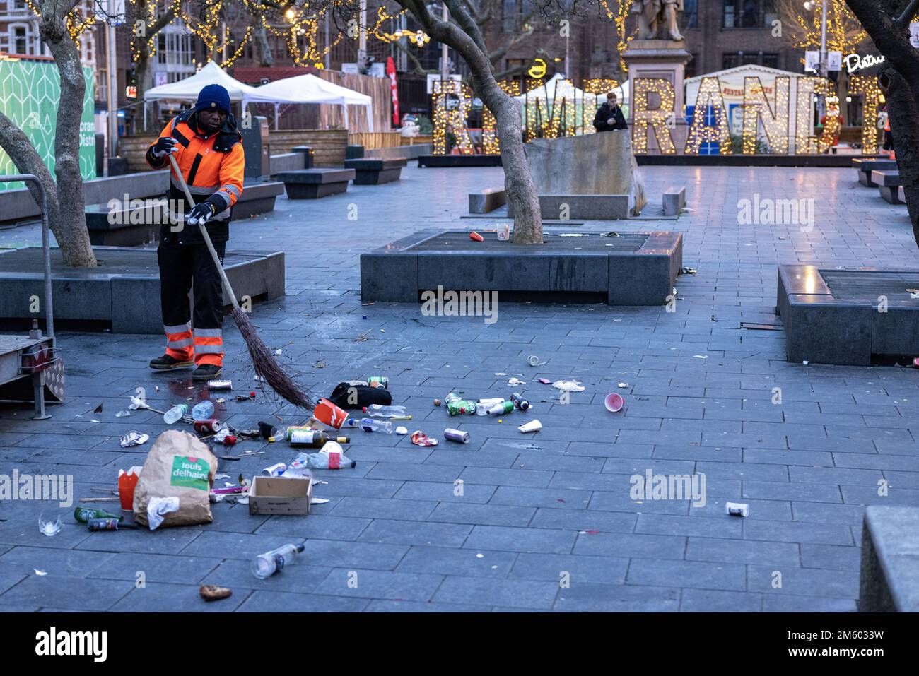 AMSTERDAM New Year's Eve mess on the Rembrandtplein. Cleaning crews