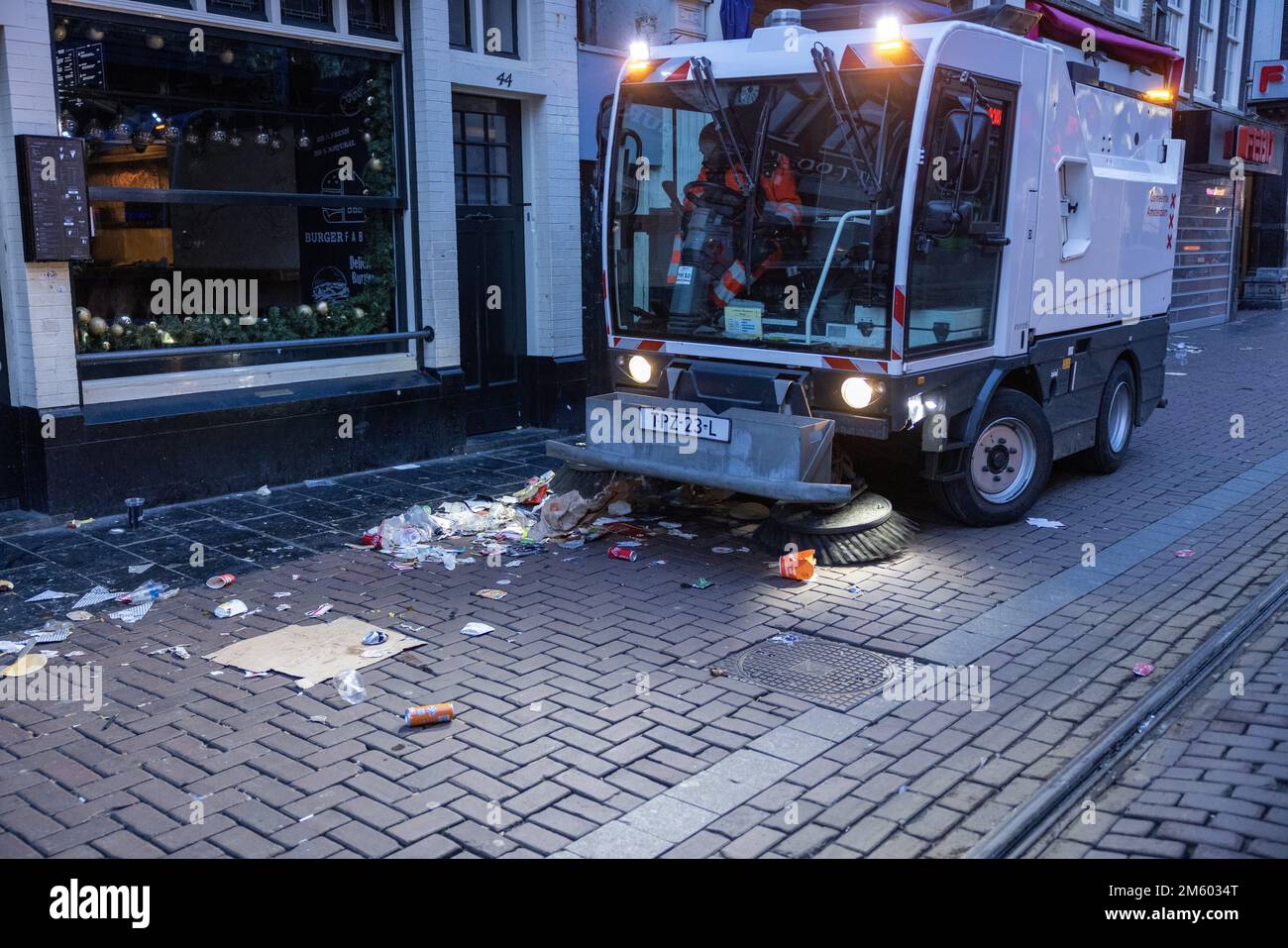 AMSTERDAM New Year's Eve mess on the Rembrandtplein. Cleaning crews