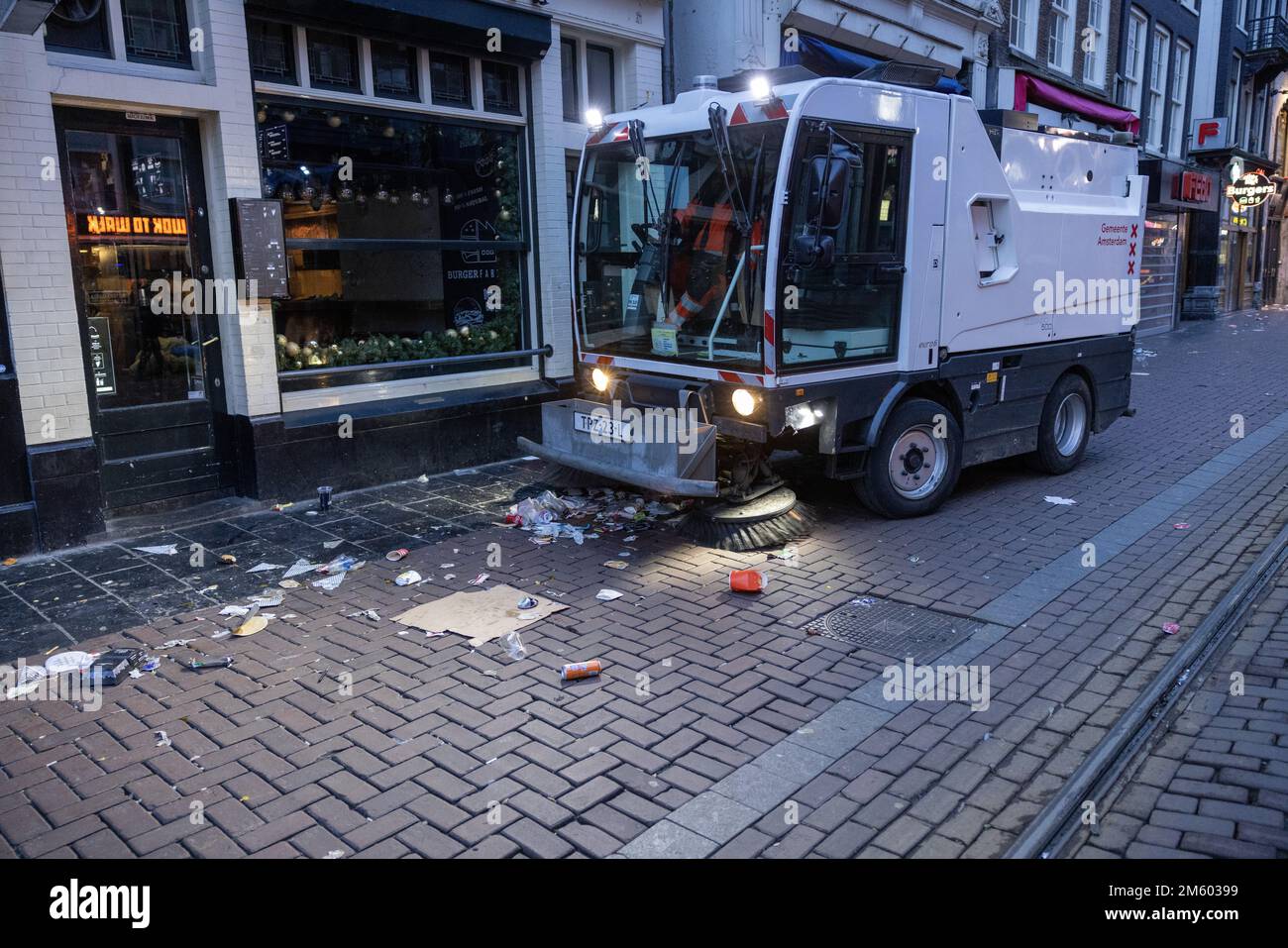 AMSTERDAM New Year's Eve mess on the Rembrandtplein. Cleaning crews