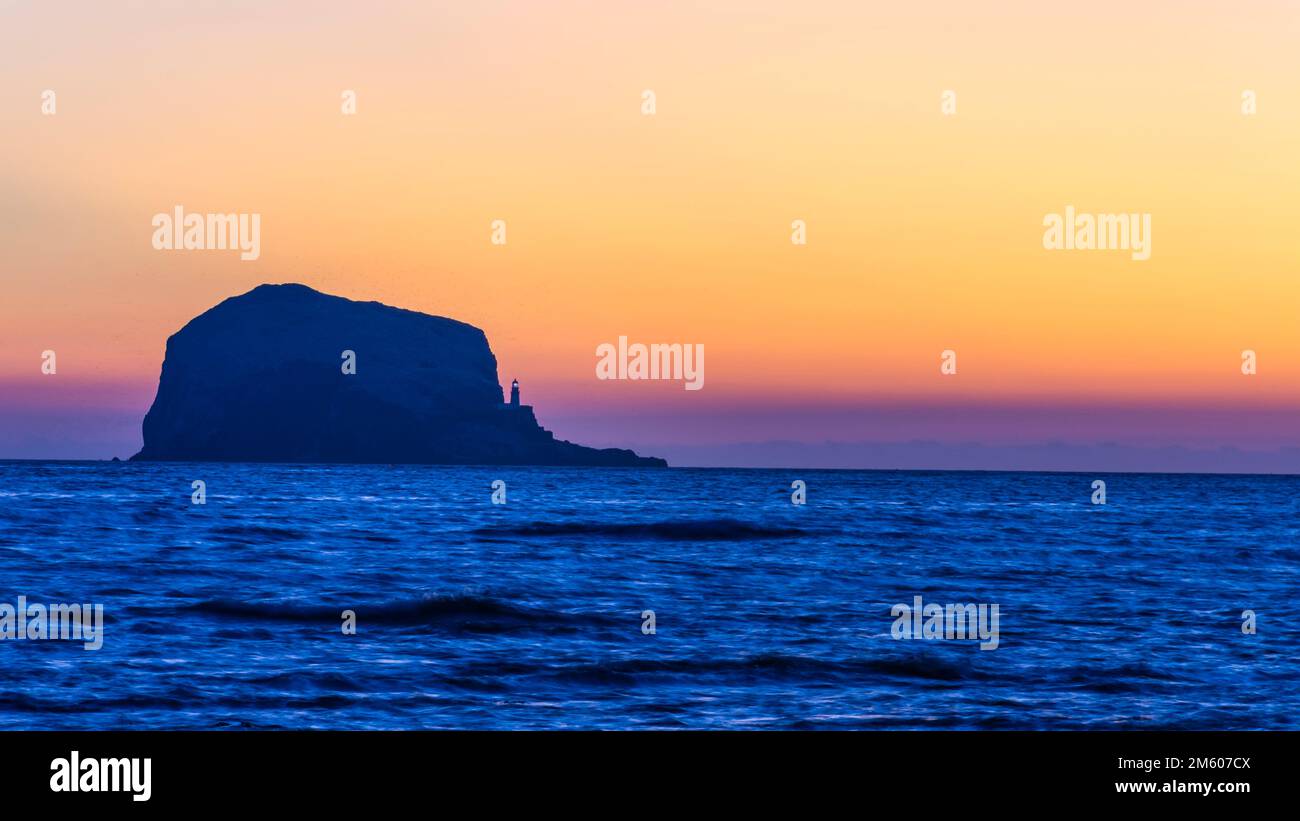 Predawn colour at the Bass Rock, East Lothian, Scotland. Natural Stock Photo