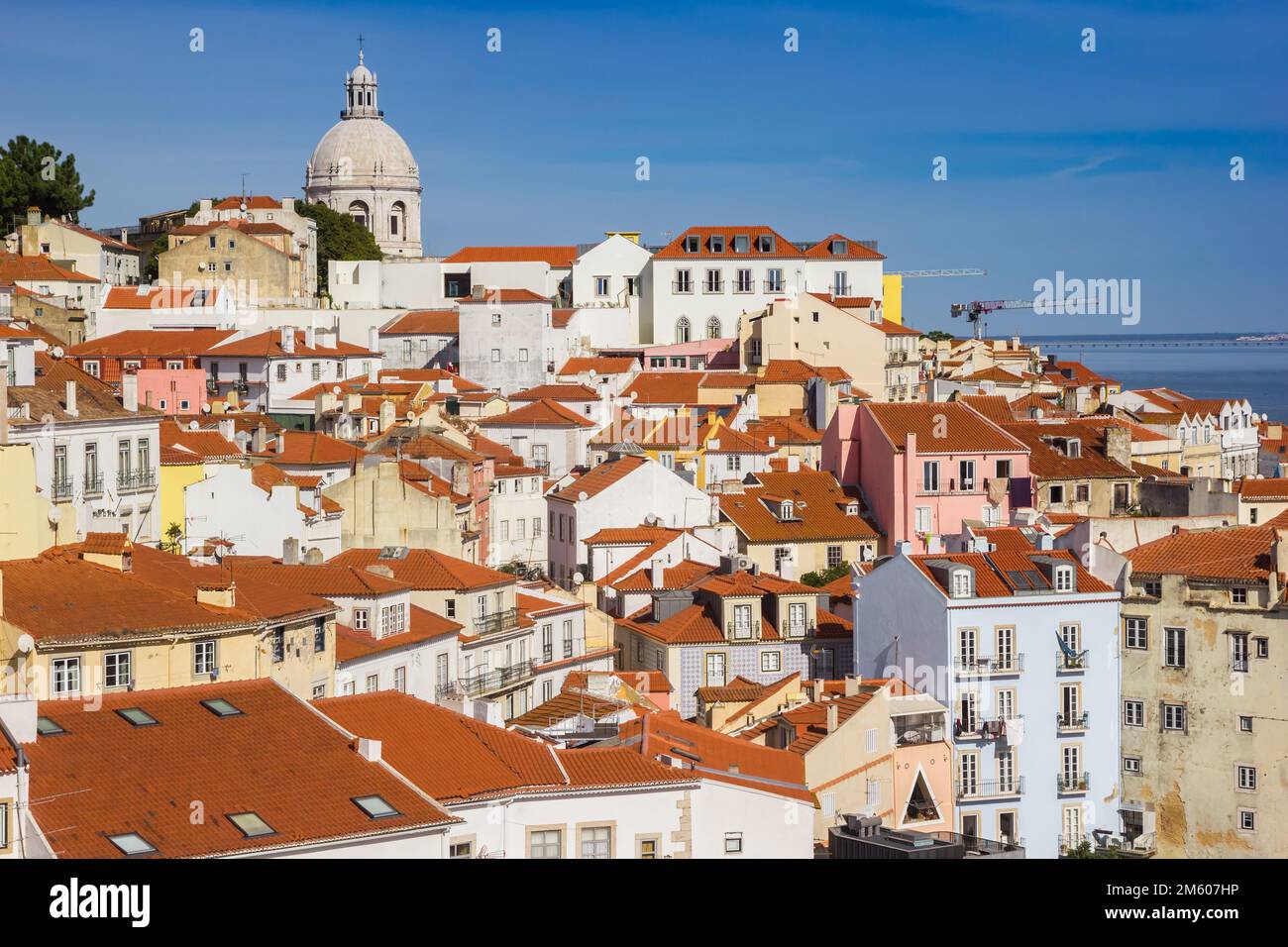 Colorful houses and the dome of the Santa Engracia church in Lisbon, Portugal Stock Photo