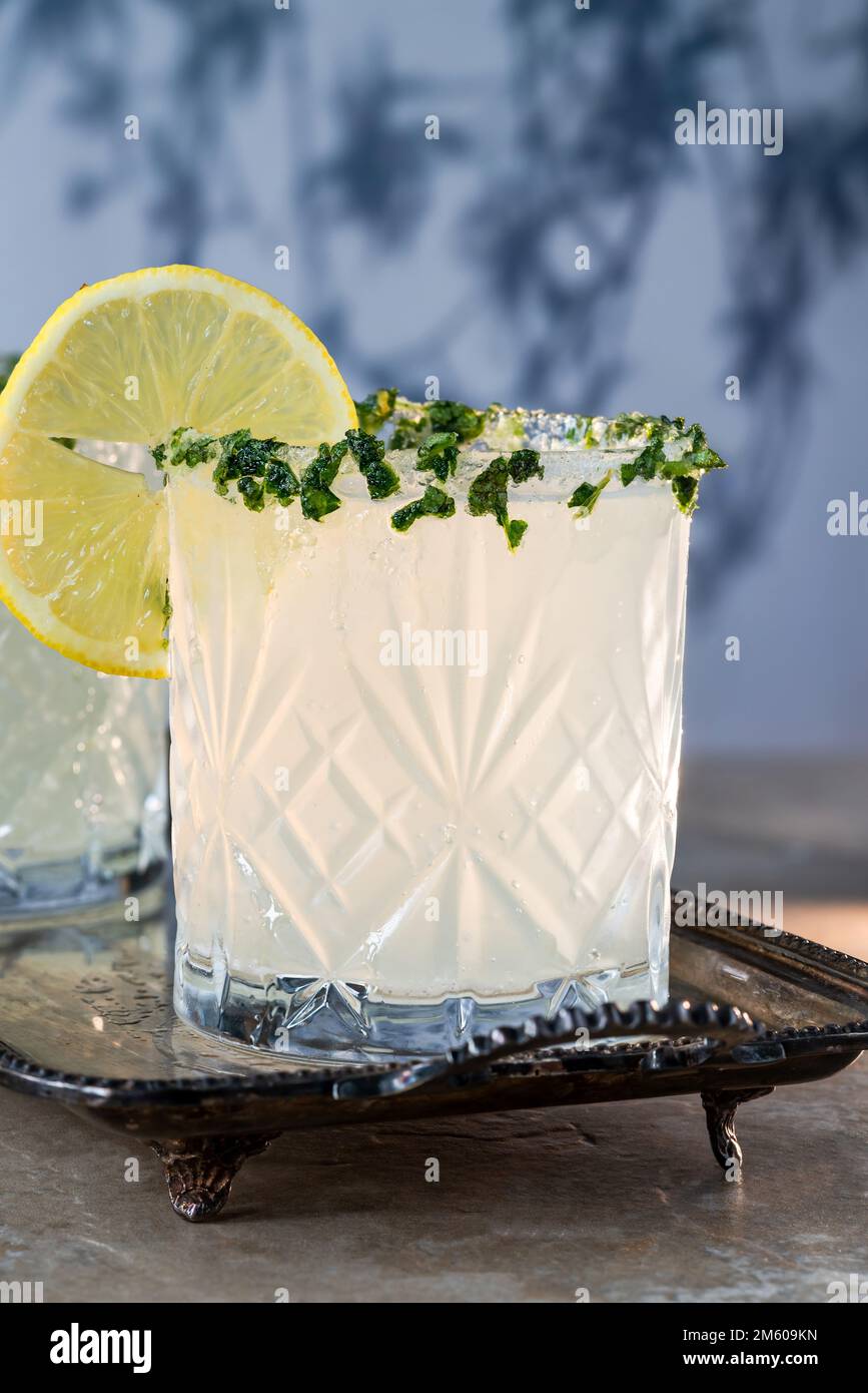 Sparkling basil infused vodka and lemonade cocktail Stock Photo Alamy