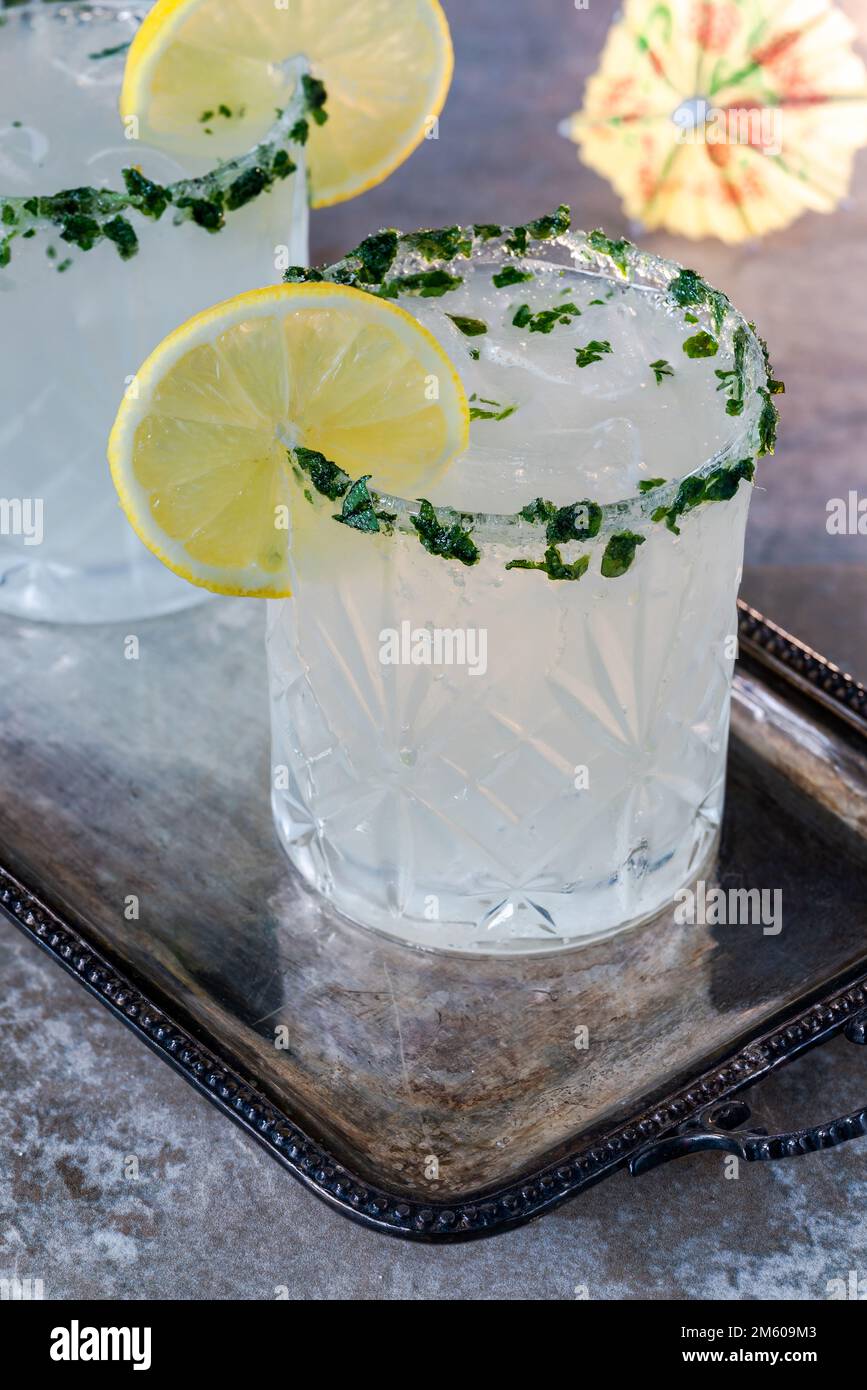 Sparkling basil infused vodka and lemonade cocktail Stock Photo Alamy