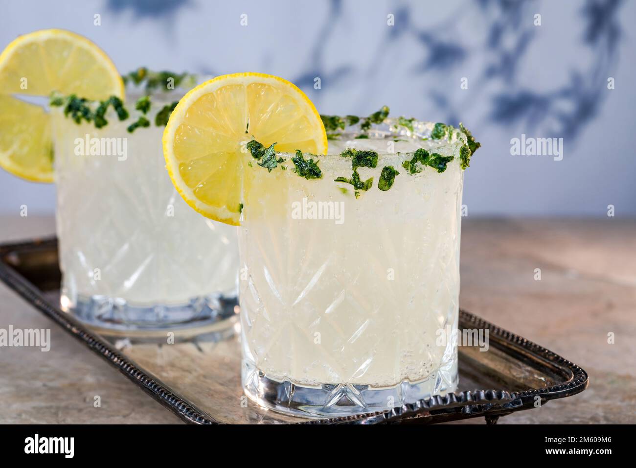 Sparkling basil infused vodka and lemonade cocktail Stock Photo Alamy