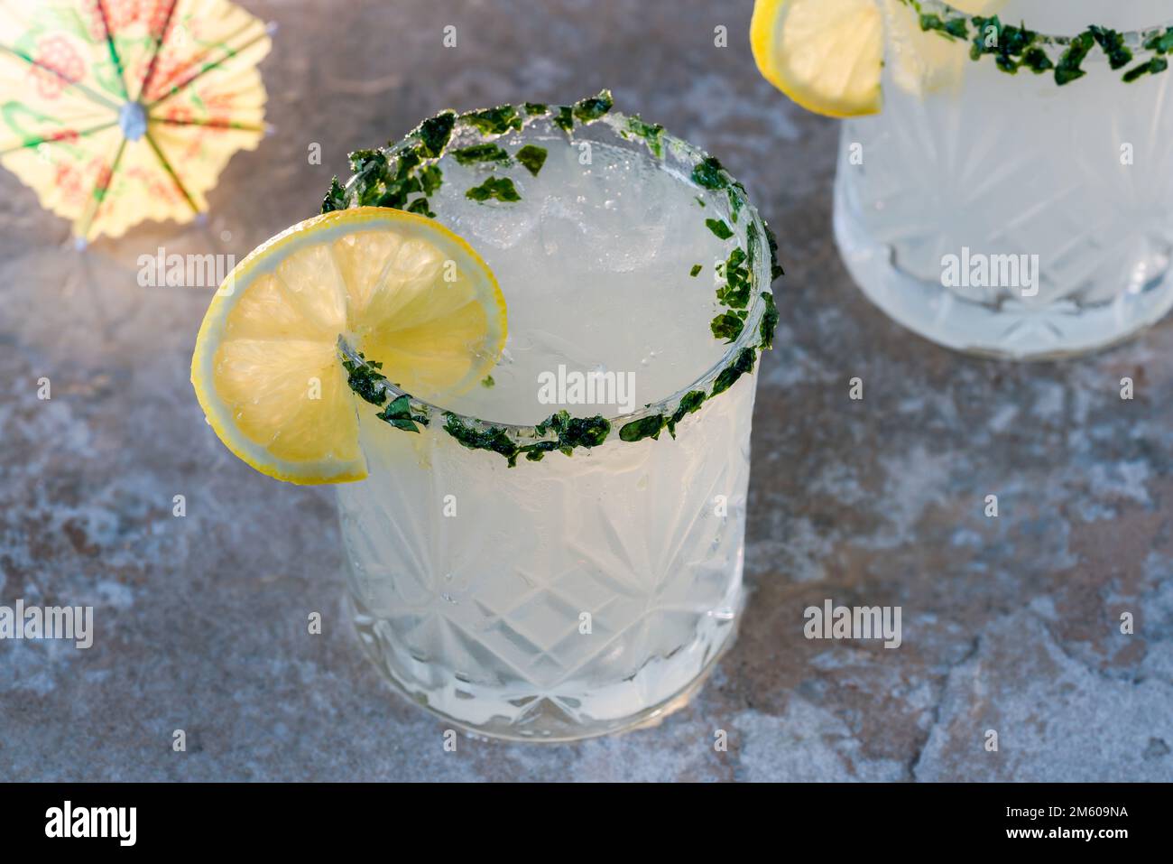 Sparkling basil infused vodka and lemonade cocktail Stock Photo Alamy