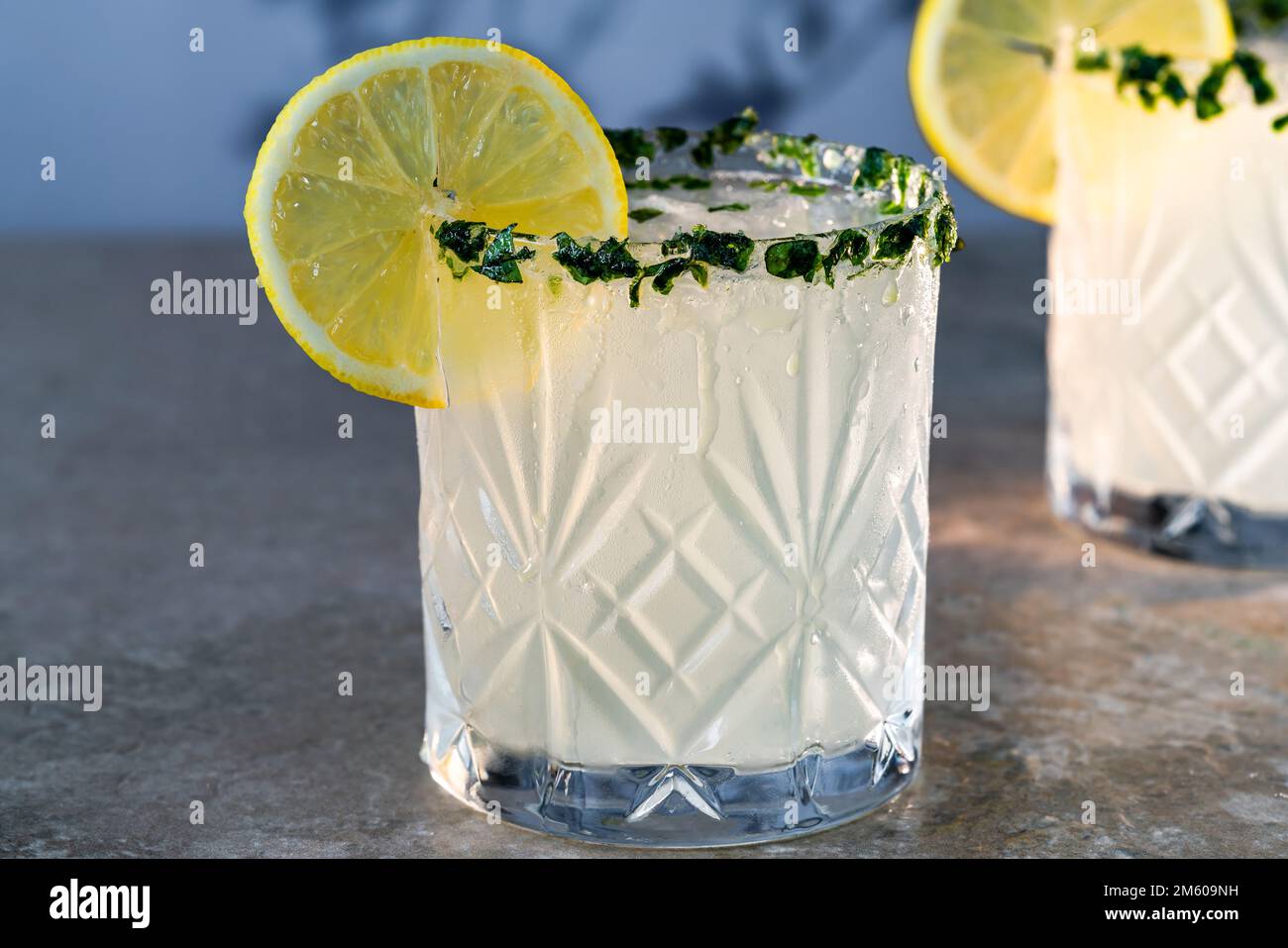 Sparkling basil infused vodka and lemonade cocktail Stock Photo Alamy