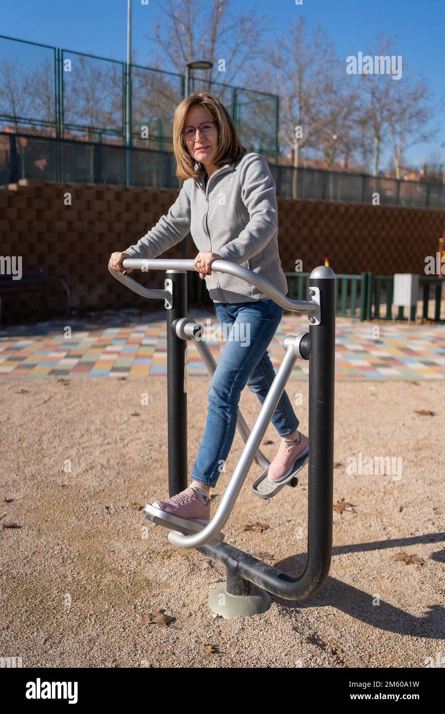 Pink Exercise Equipment in Public Park Stock Image - Image of park