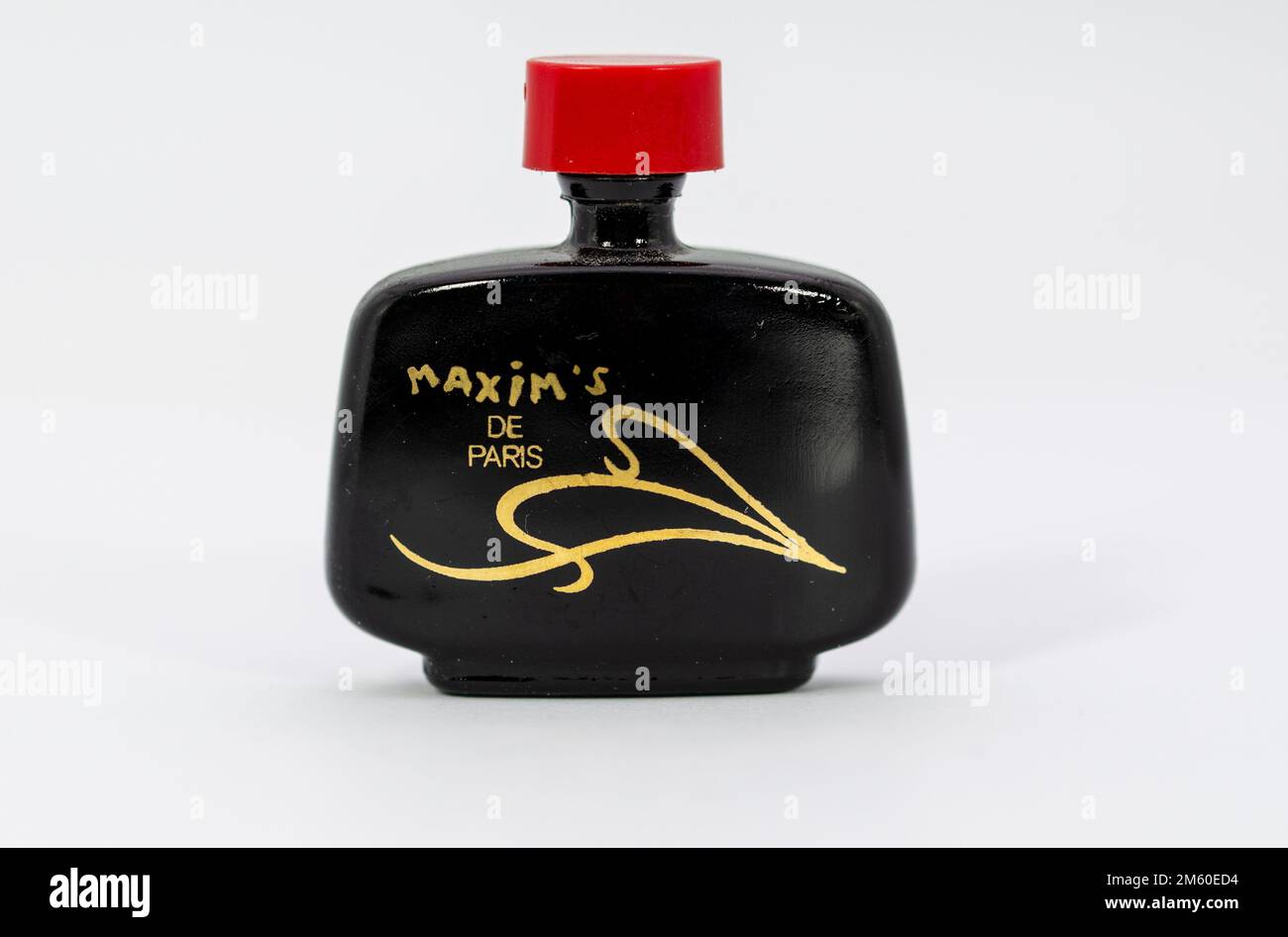 Aachen February 2021: Close-up of a miniature perfume Maxim's De Paris Parfum Miniature Perfume Bottle .14 oz Stock Photo