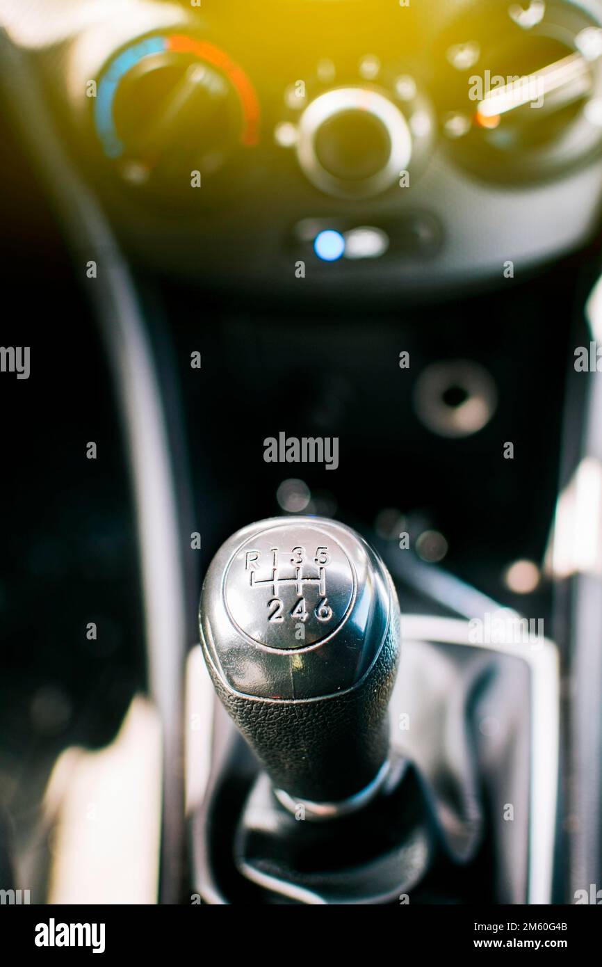 Close up of a car gear knob. Detail view of a vehicle transmission