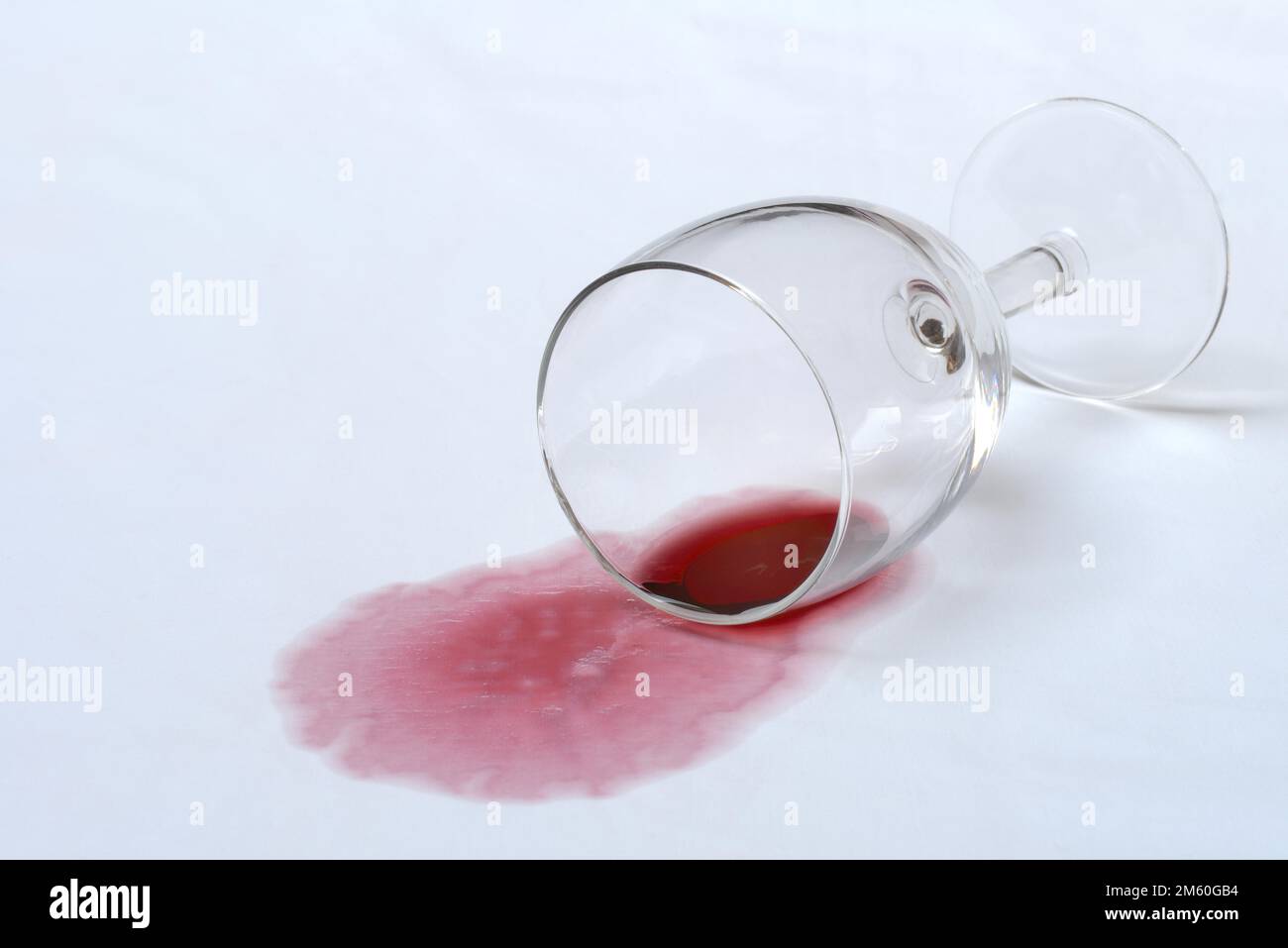 Red wine stain, overturned red wine glass on fabric, stain Stock Photo Alamy