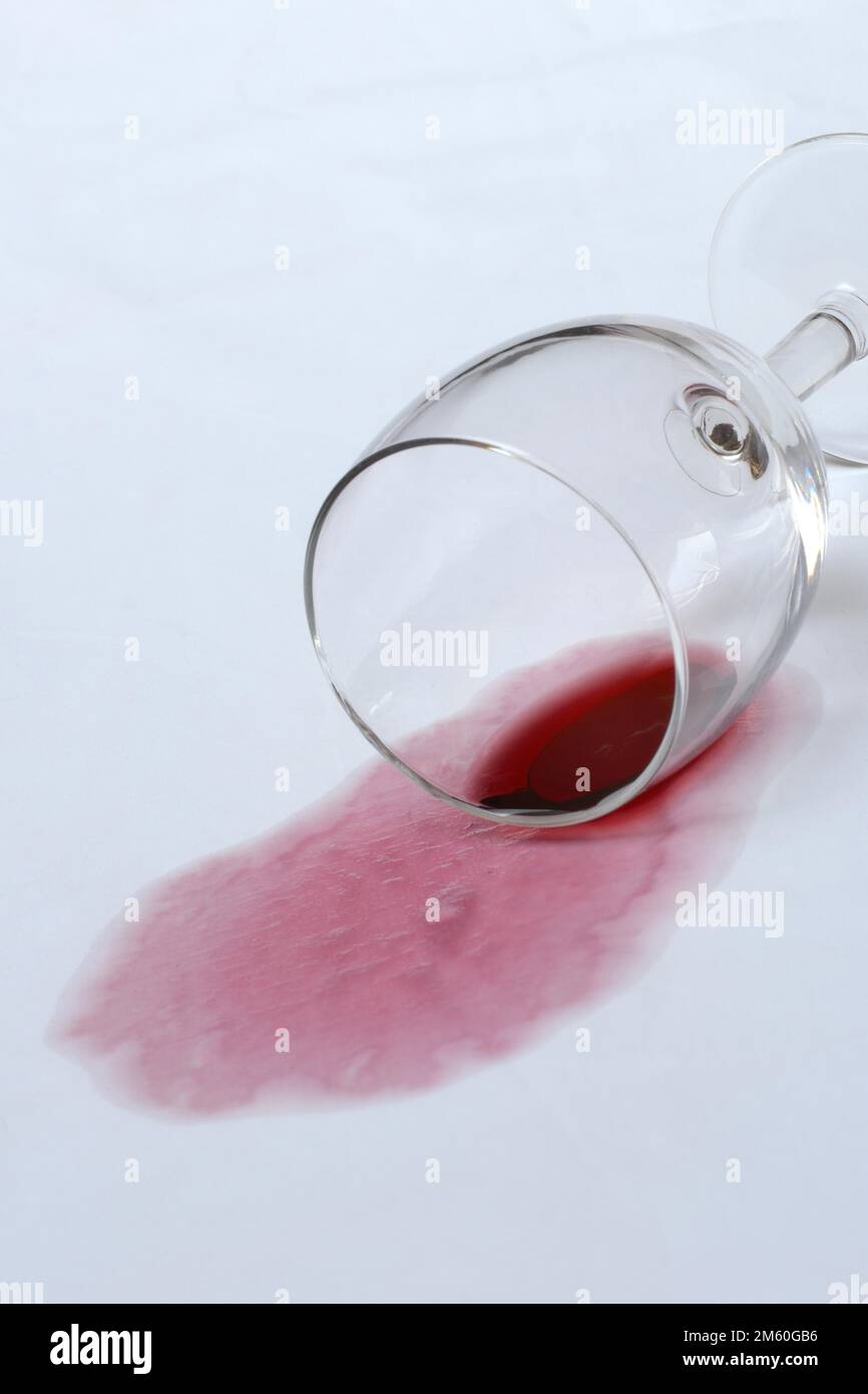 Red wine stain, overturned red wine glass on fabric, stain Stock Photo