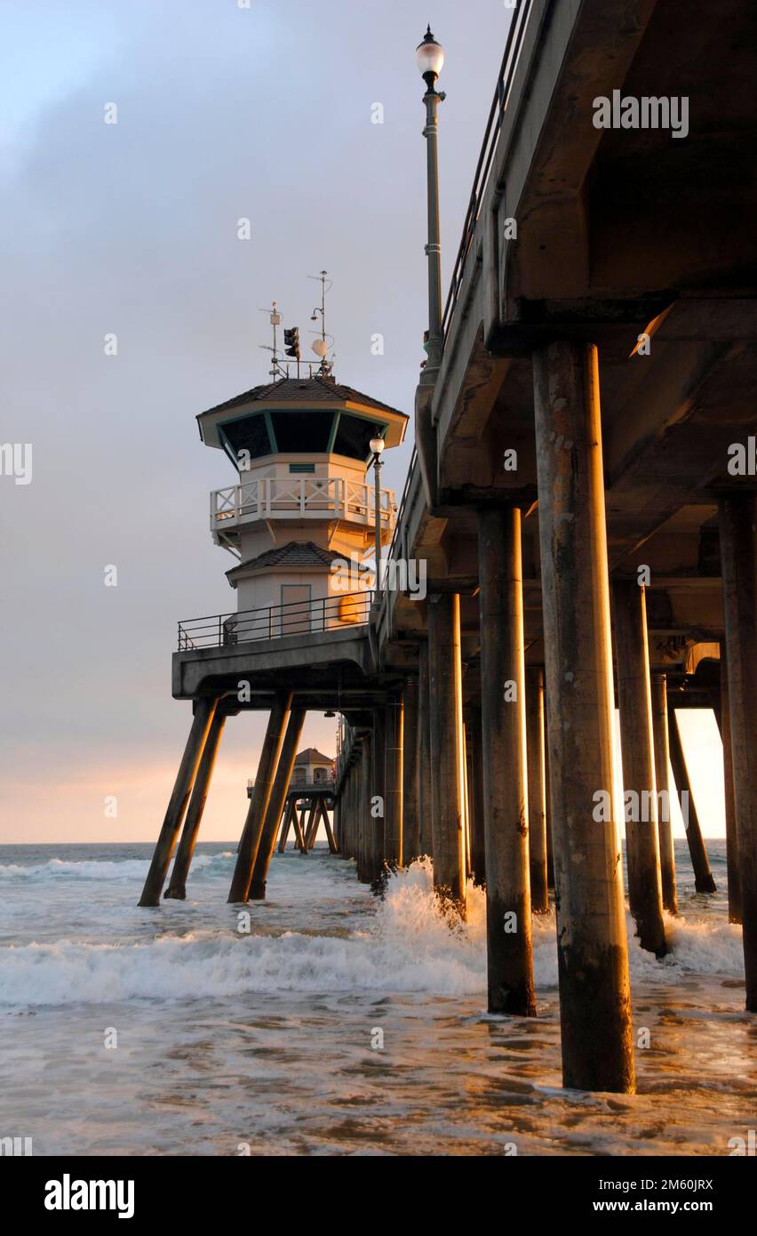 Low angle view of Huntington Beach Pier at sunset in California, USA Stock Photo
