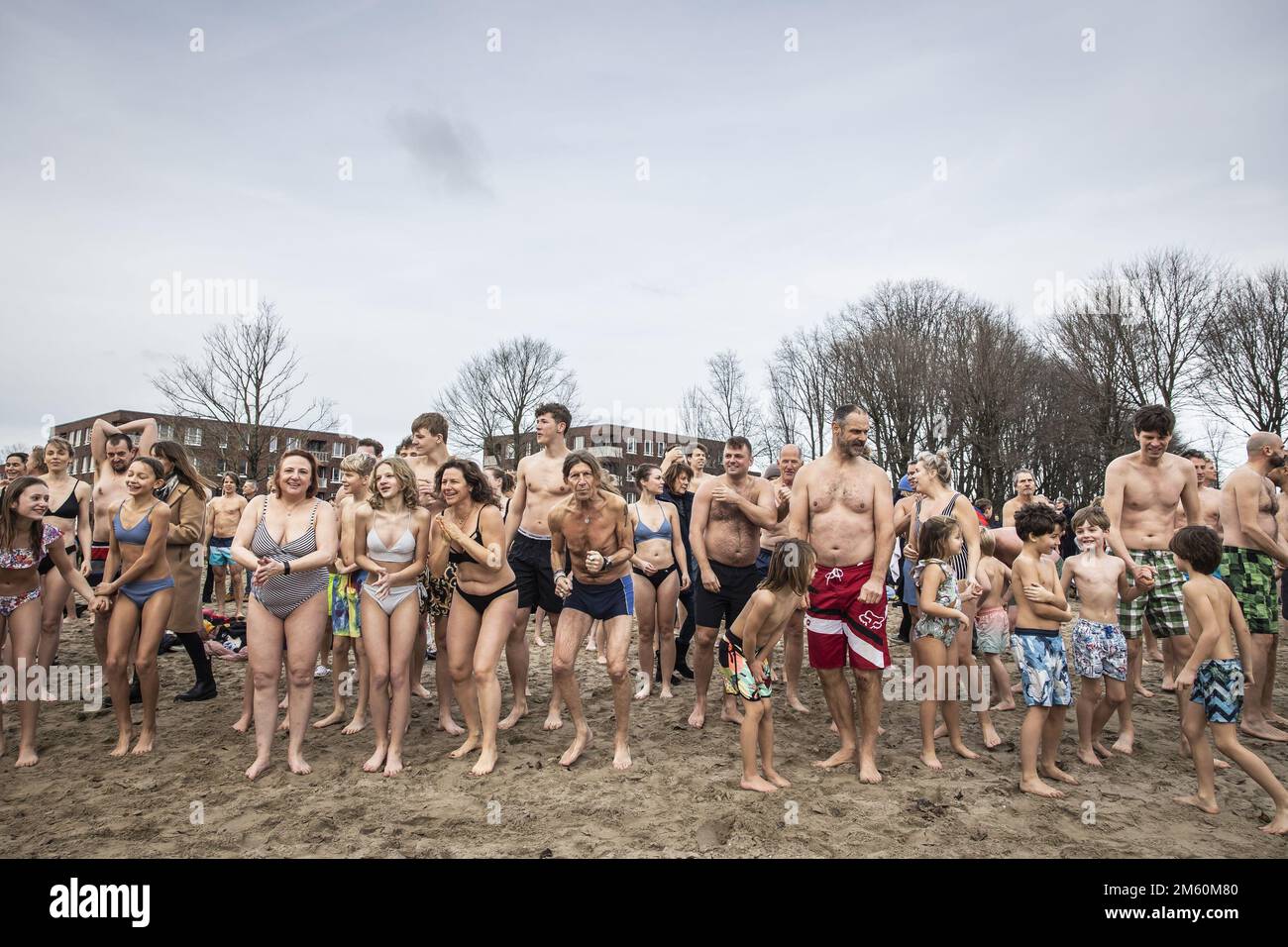 Amsterdam, January 1, 2023 - NEW YEAR'S DIVE. Waiting for. the go-ahead. The traditional Unoxless New Year's Dive in the Sloterplas in Amsterdam. It's not that cold this year. Photo ANP Dingena Mol netherlands out - belgium out Stock Photo