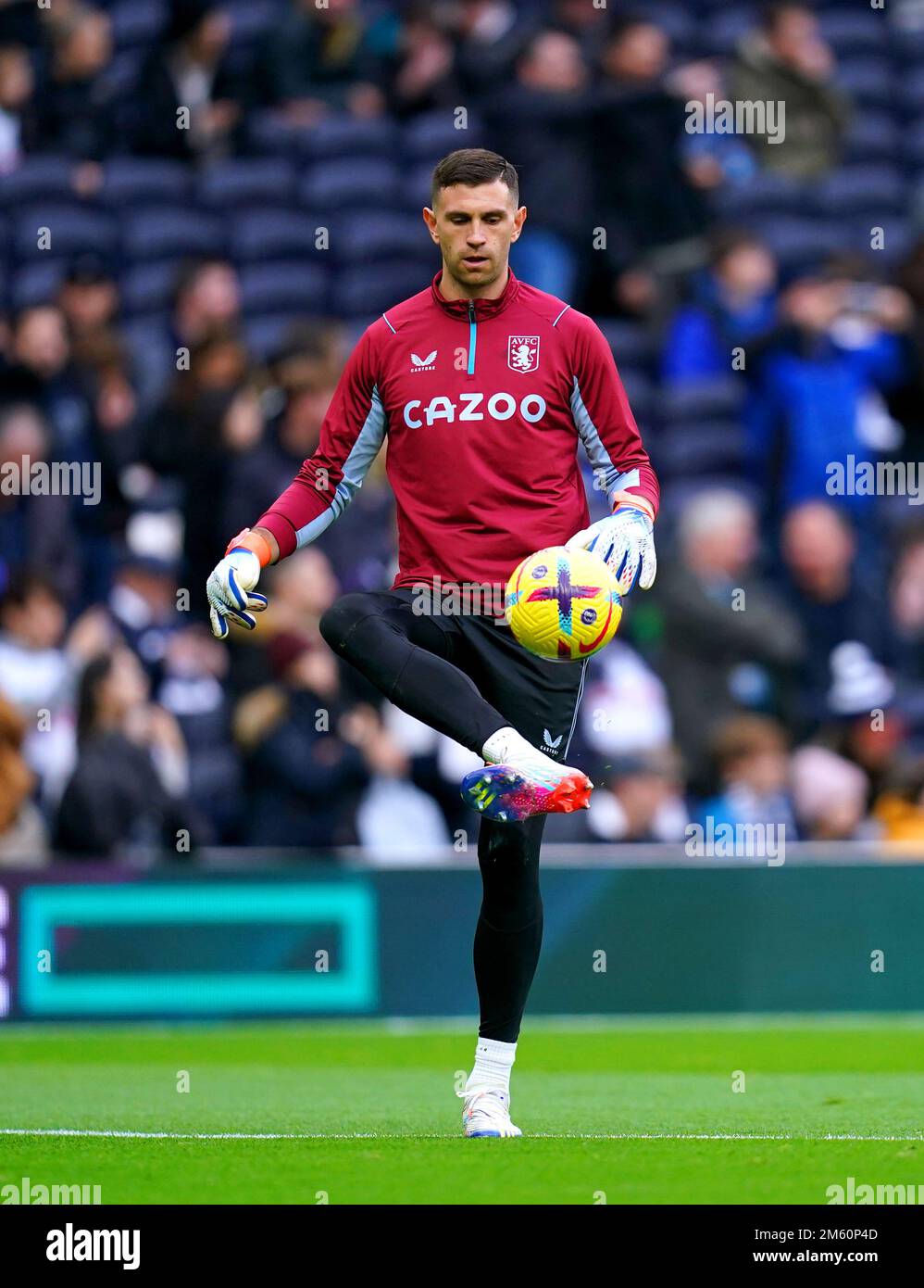 Aston Villa goalkeeper Emiliano Martinez warms up on the pitch ahead of the  Premier League match at the Tottenham Hotspur Stadium, London. Picture  date: Sunday January 1, 2023 Stock Photo - Alamy