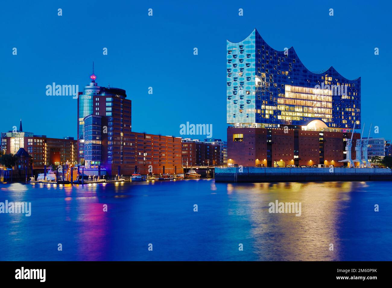 Elbe Philharmonic Hall and Columbus Haus in the evening, Hafencity, Hamburg, Germany Stock Photo