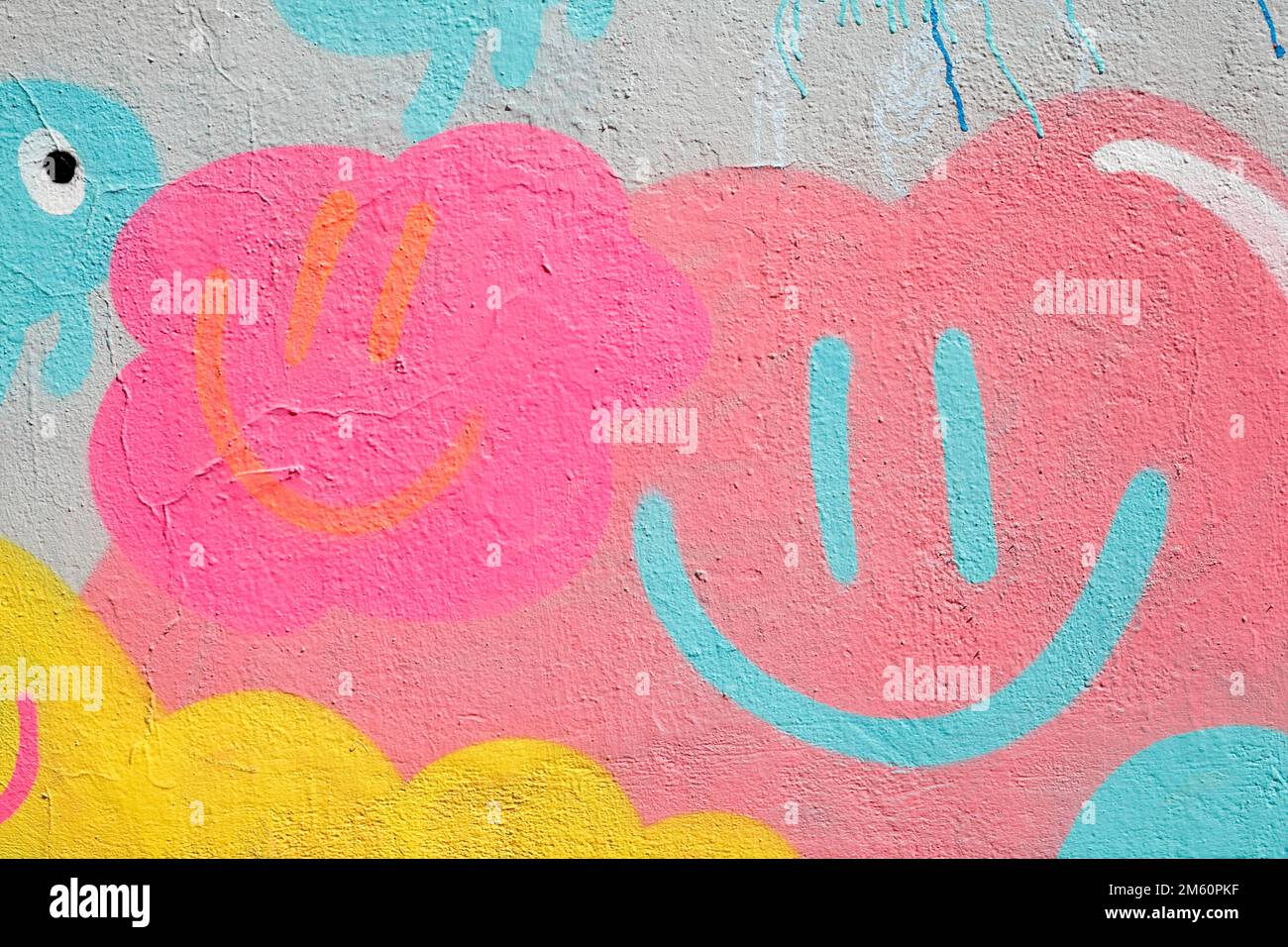 Colourful smiley painted on a house wall, Karolinenviertel, Hamburg, Germany Stock Photo