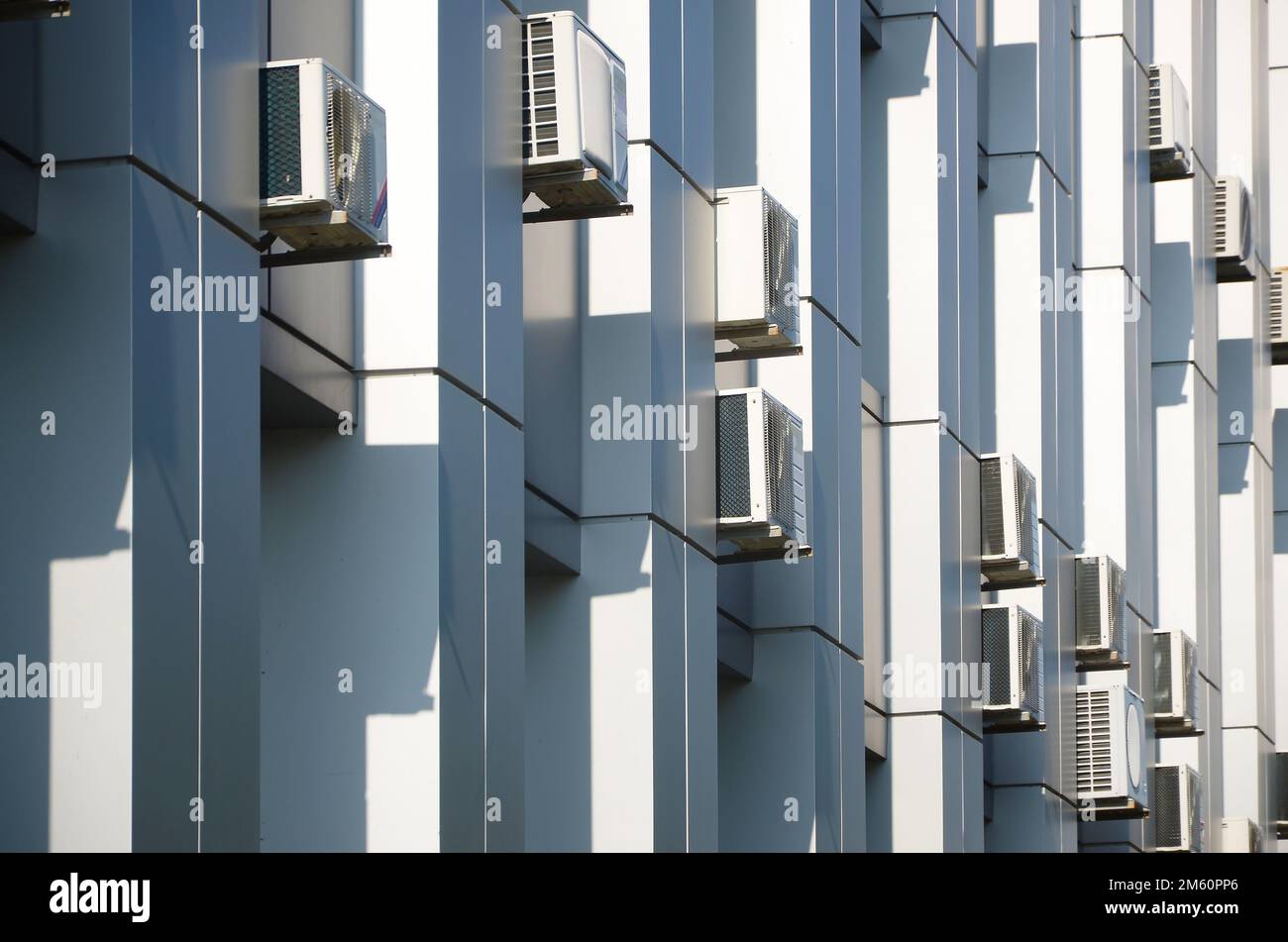 Many HVAC air conditioning and ventilation systems on wall. Outdoor Air