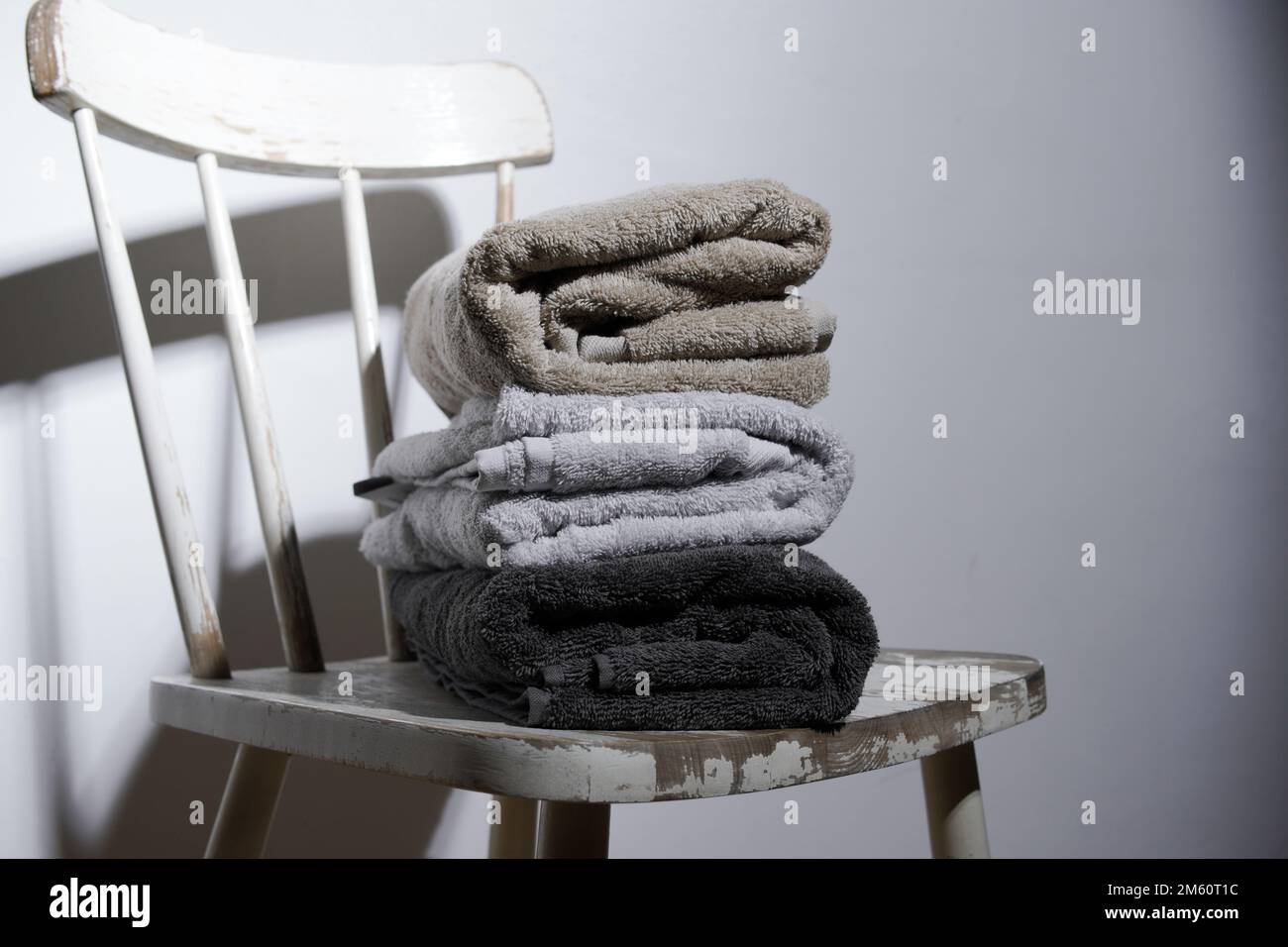 clean covers in a pile on a chair Stock Photo