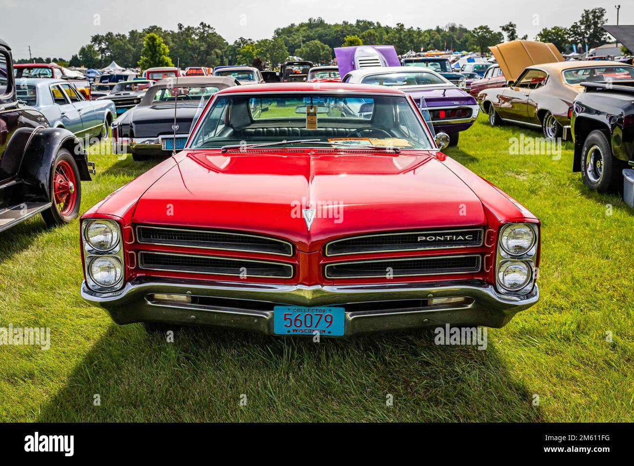 Iola, WI - July 07, 2022: High perspective front view of a 1966 Pontiac Ventura 2 Door Hardtop at a local car show. Stock Photo