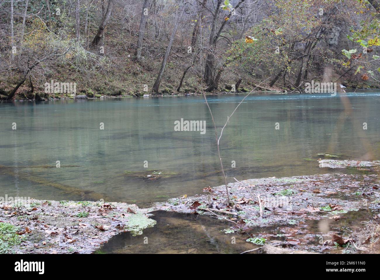 wide gentle blue river at the Ozark National Scenic Riverways, Big Spring Stock Photo
