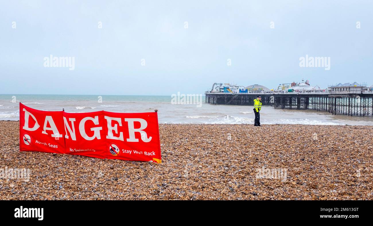 Brighton UK 1st January 2023 - Police evacuate a part of Brighton beach to the east of Brighton Palace Pier after a WW2 shell was discovered washed up . Members of the Royal Navy Bomb Disposal team exploded the device in the mid afternoon  : Credit Simon Dack / Alamy Live News Stock Photo