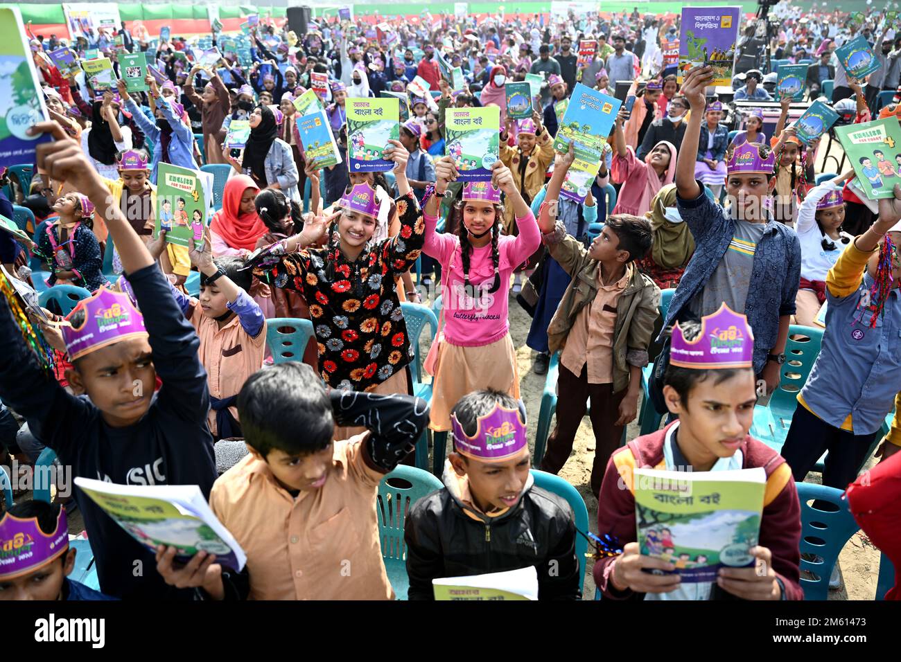 Dhaka, Bangladesh. 1st Jan 2023. Student celebrate with new textbooks